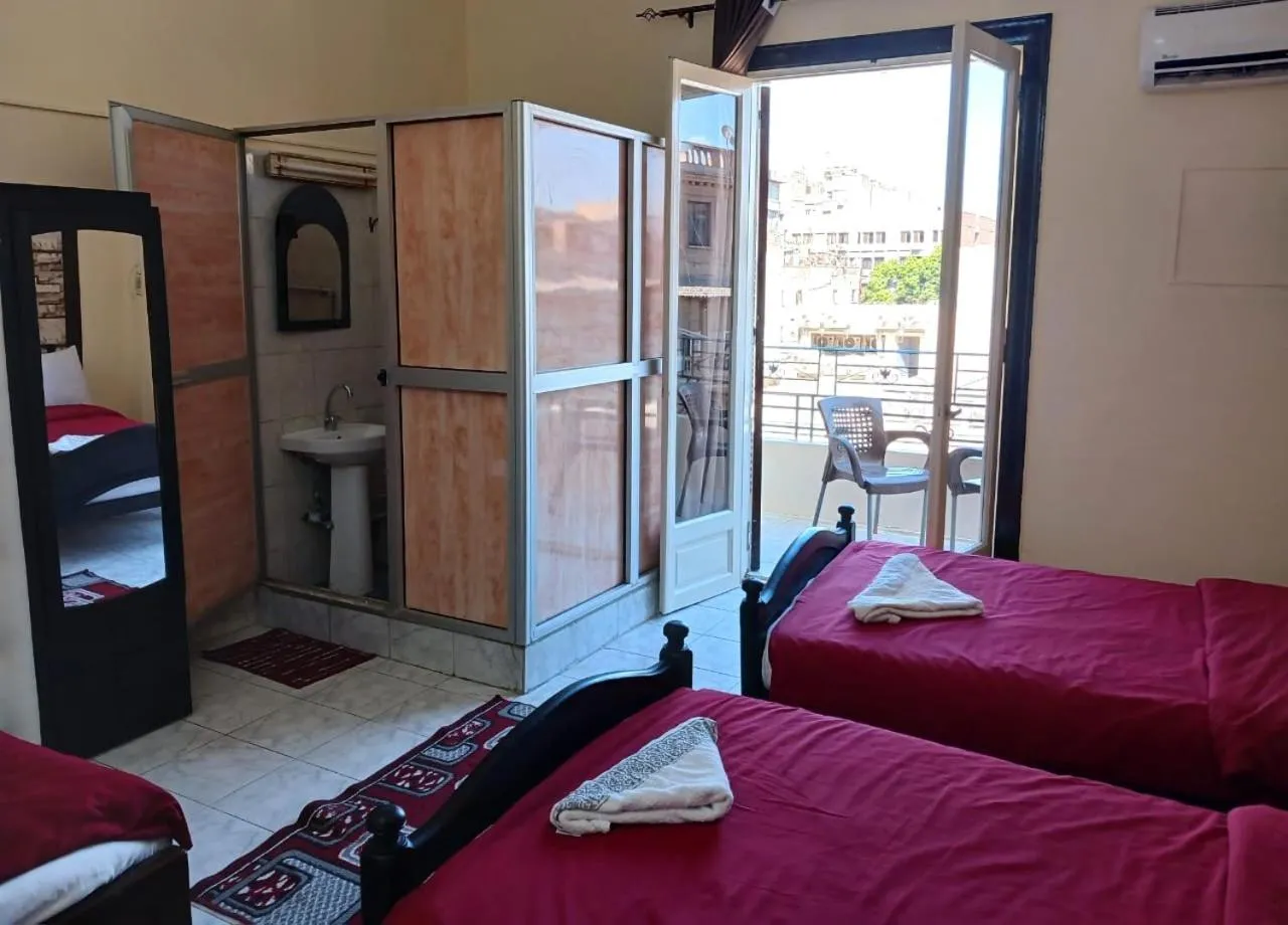 Bed in New Palace Hotel