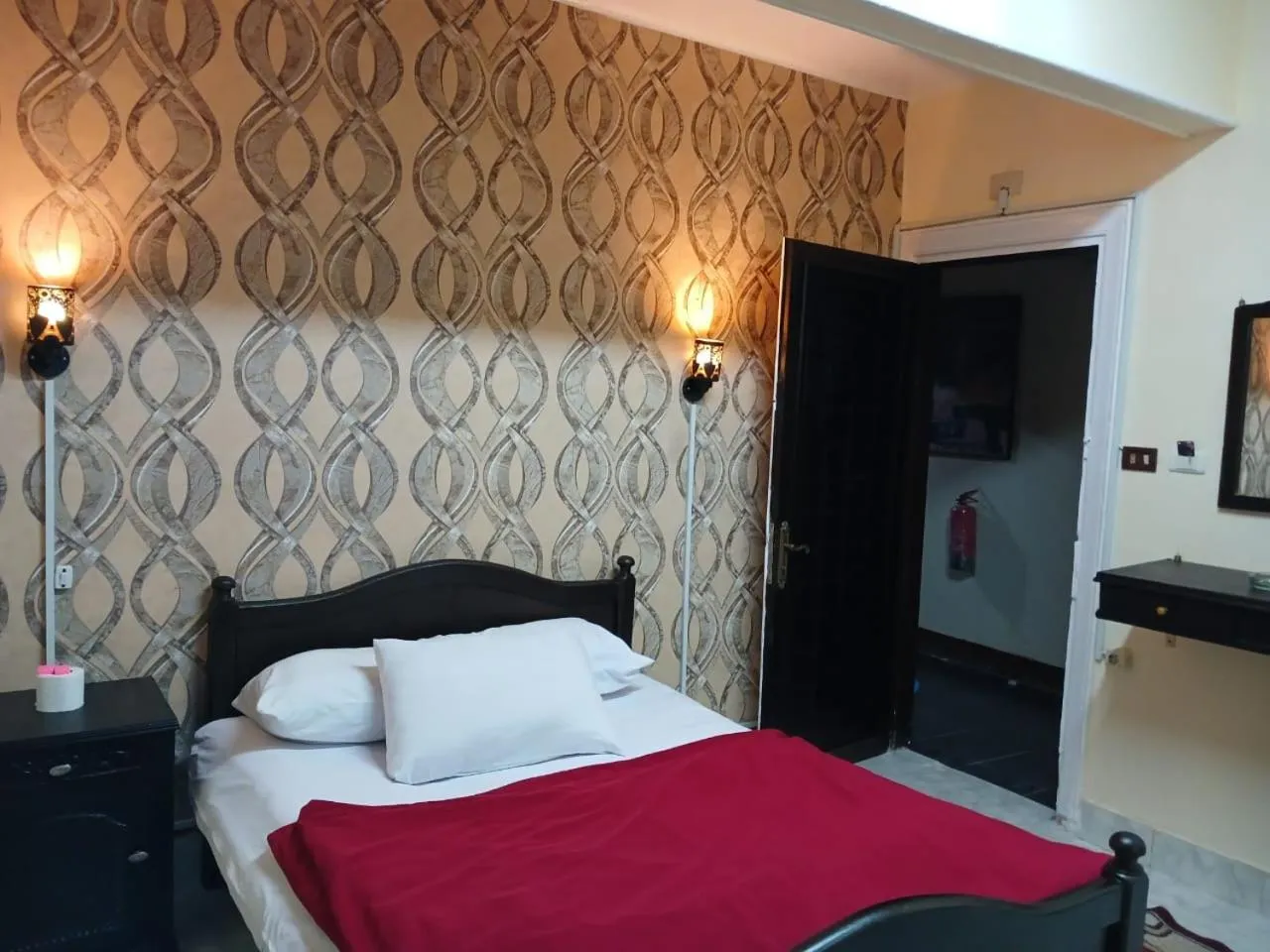 Bed in New Palace Hotel