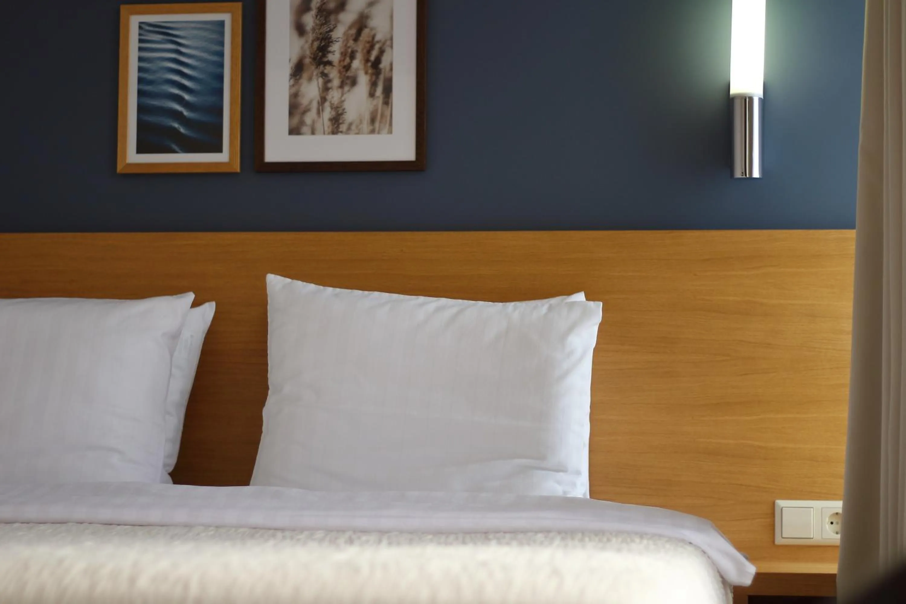 Bed in Hotel Kolumbs