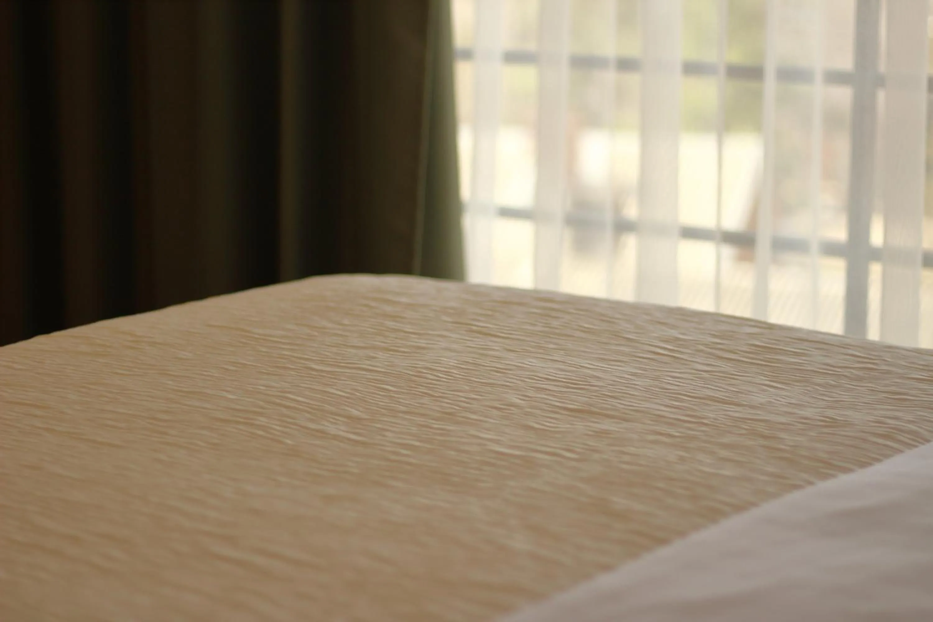 Bed in Hotel Kolumbs