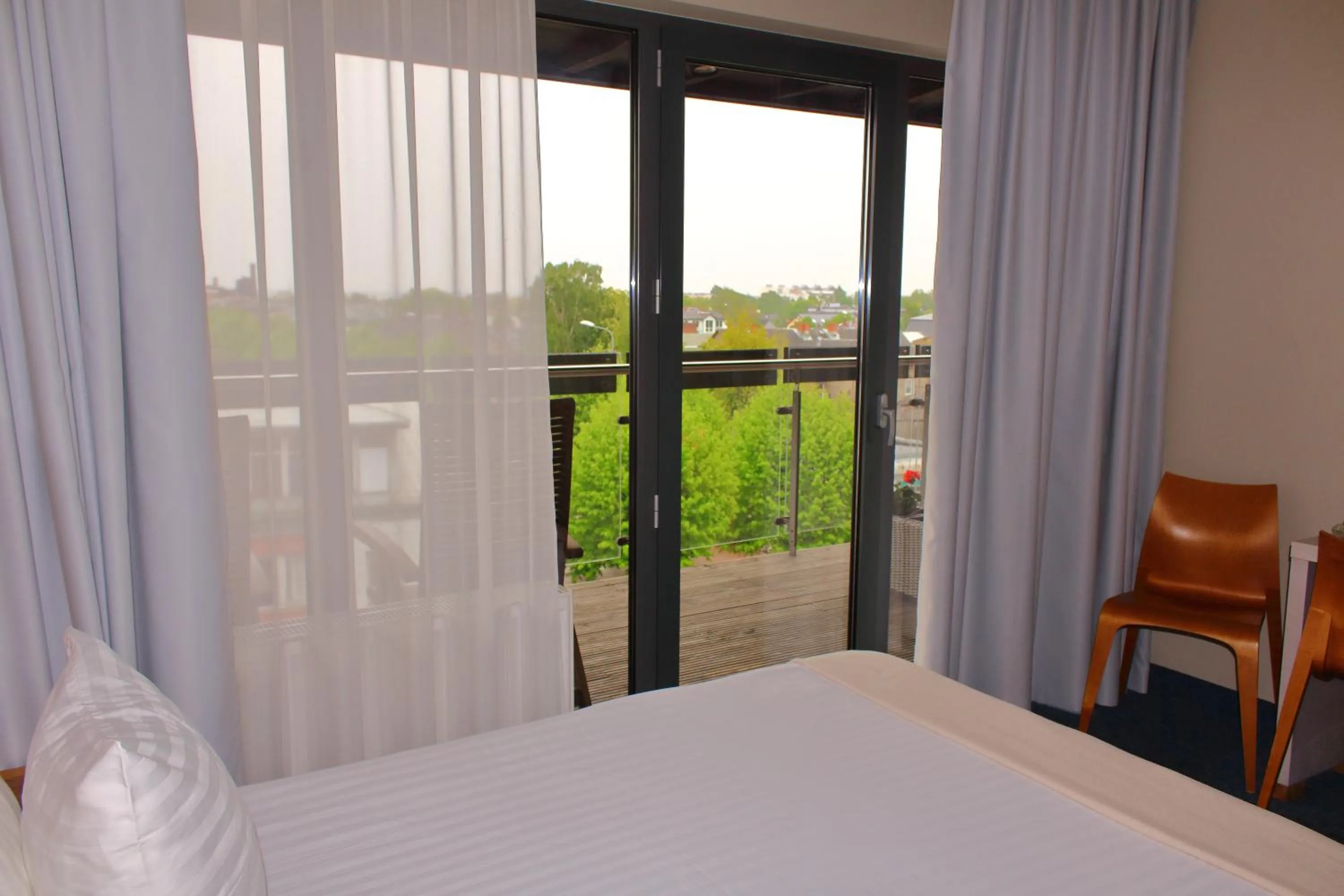 Bed in Hotel Kolumbs