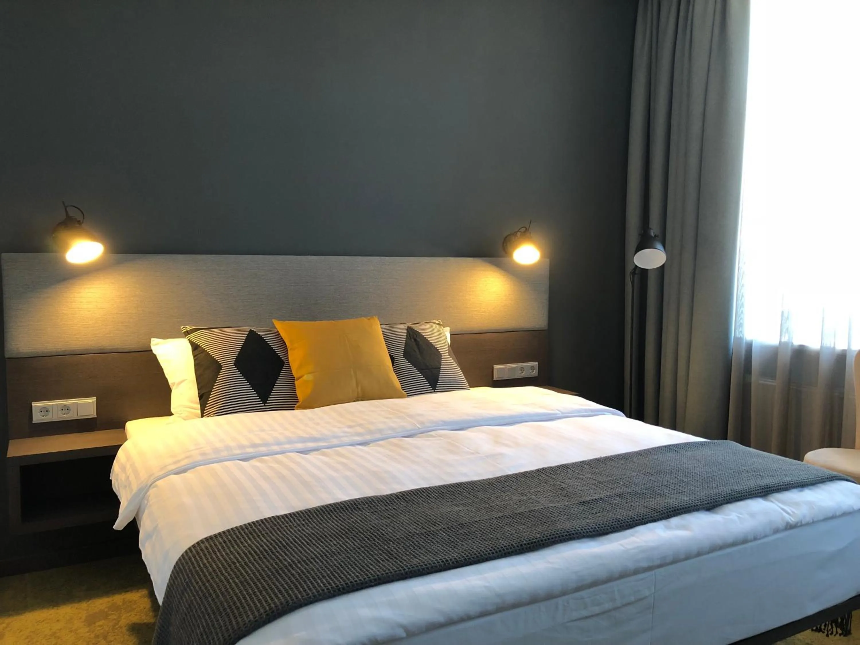 Bed in Hotel Kolumbs