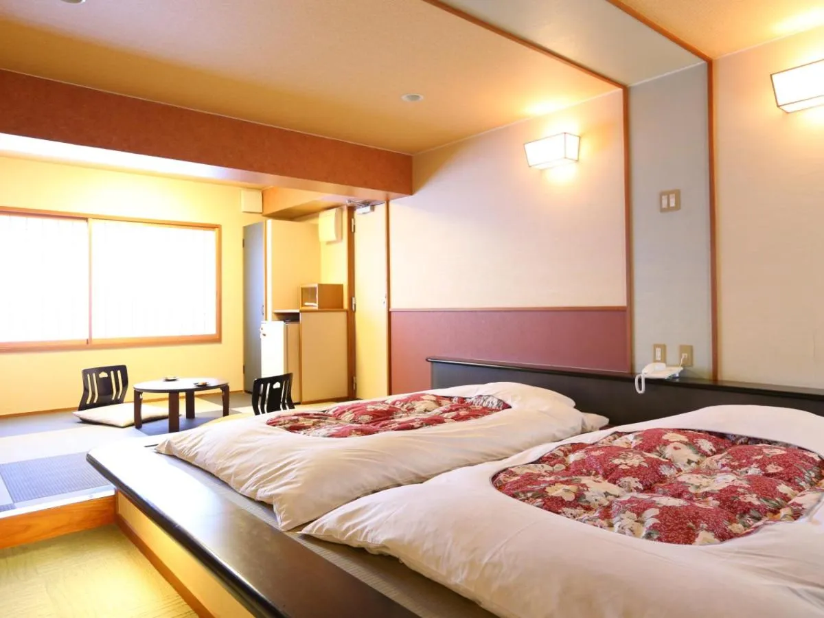 Living room, Bed in Club Wyndham Chikumakan Nagano