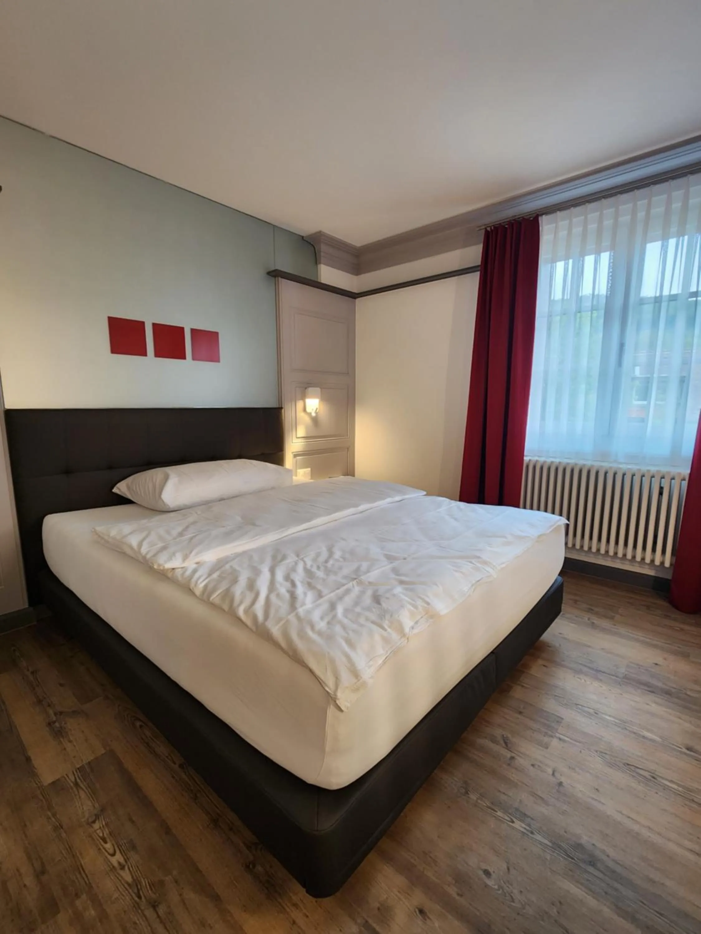 Property building, Bed in Hotel Balsthal