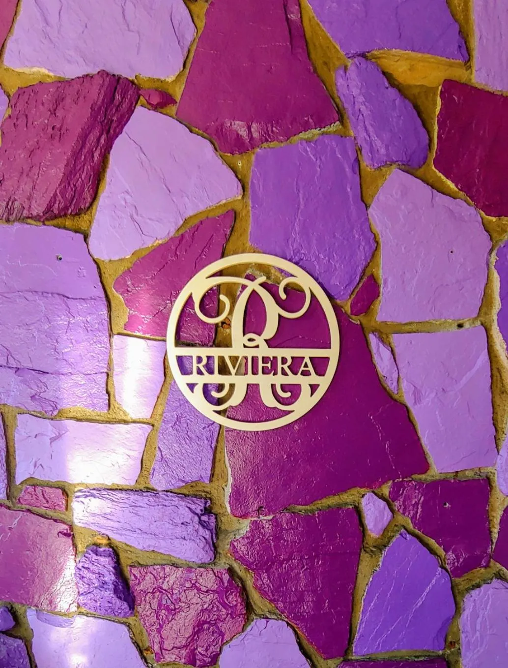 Property logo or sign in Riviera Motel