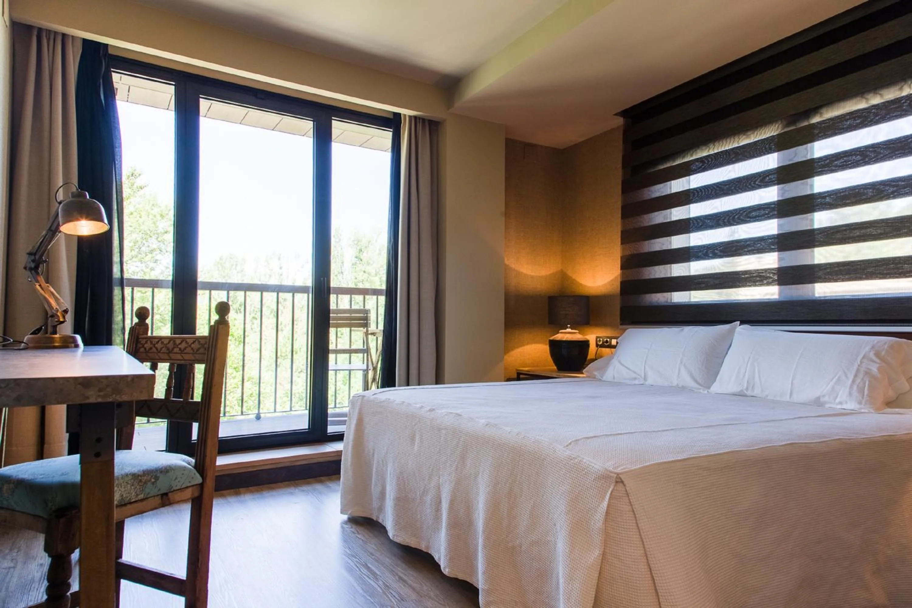 Bed in Alojamientos Ainsa Sanchez