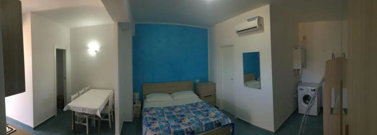 Photo of the whole room, Bed in Residence Menè