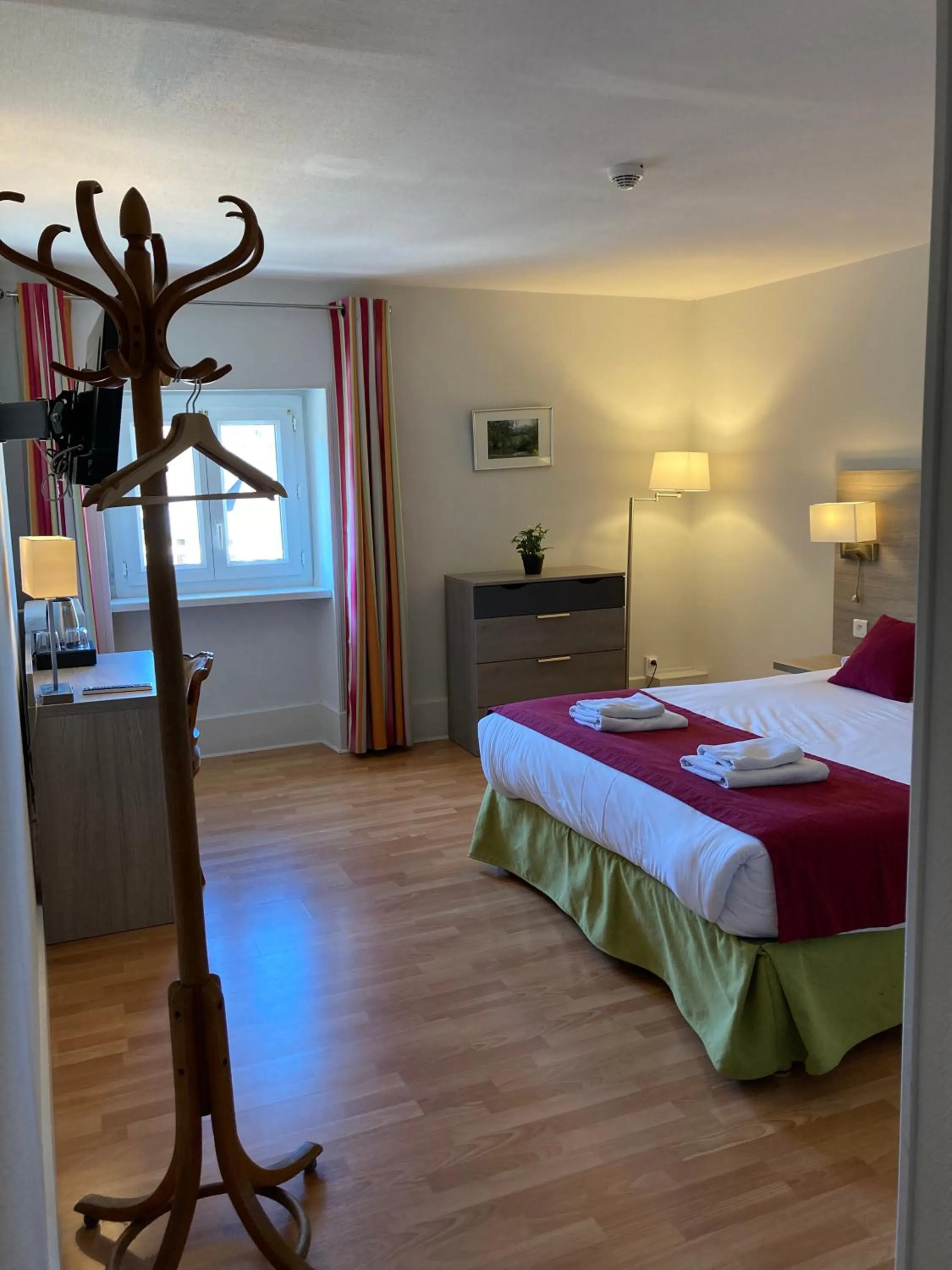 Bed in Hôtel de la Poste