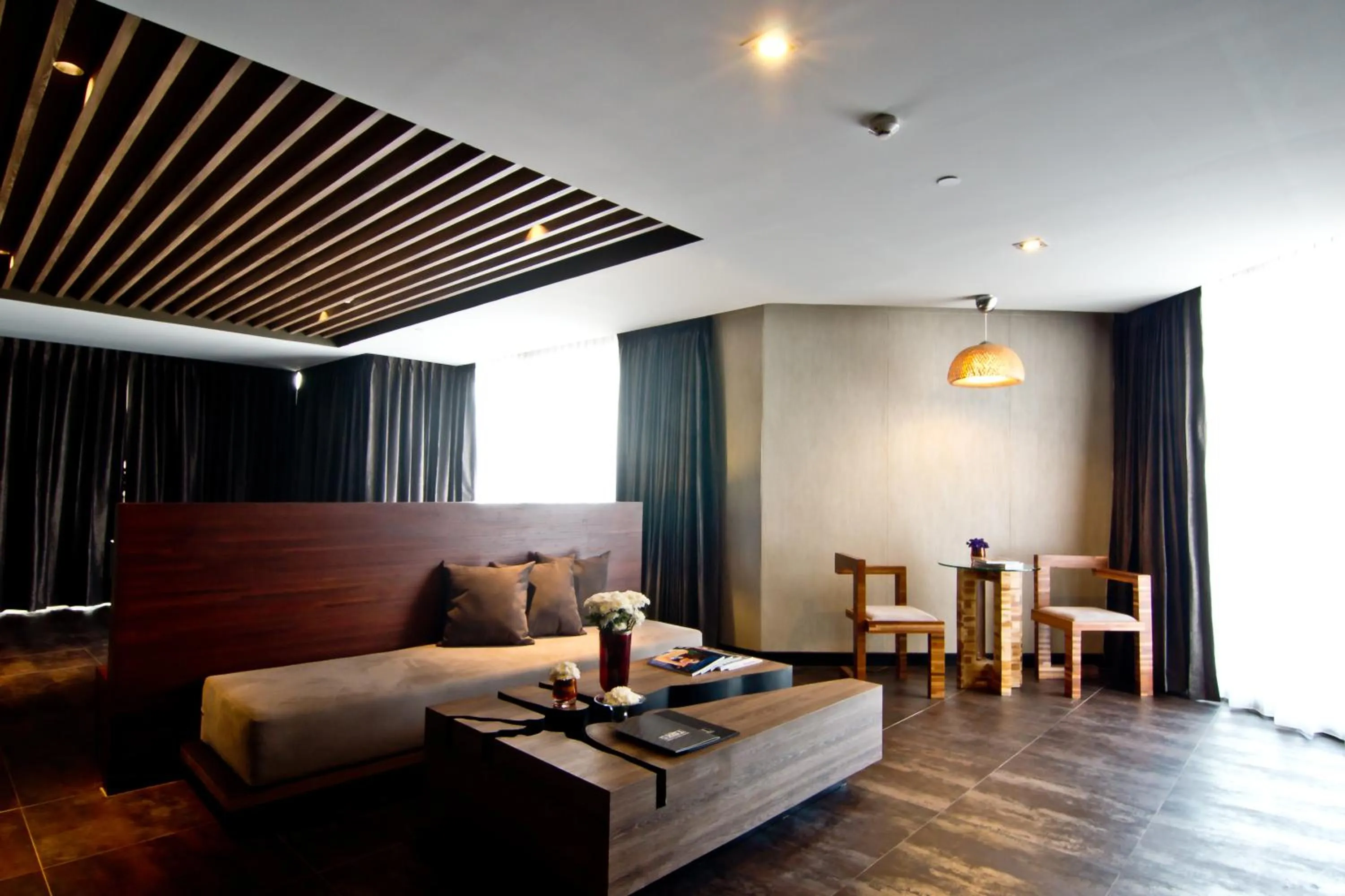 Communal lounge/ TV room in Tsix5 Hotel