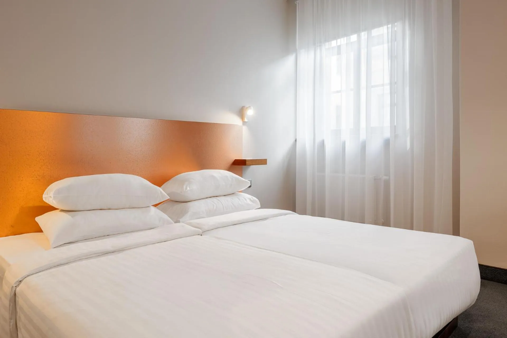 Bed in RIJA Riga City Centre Hotel