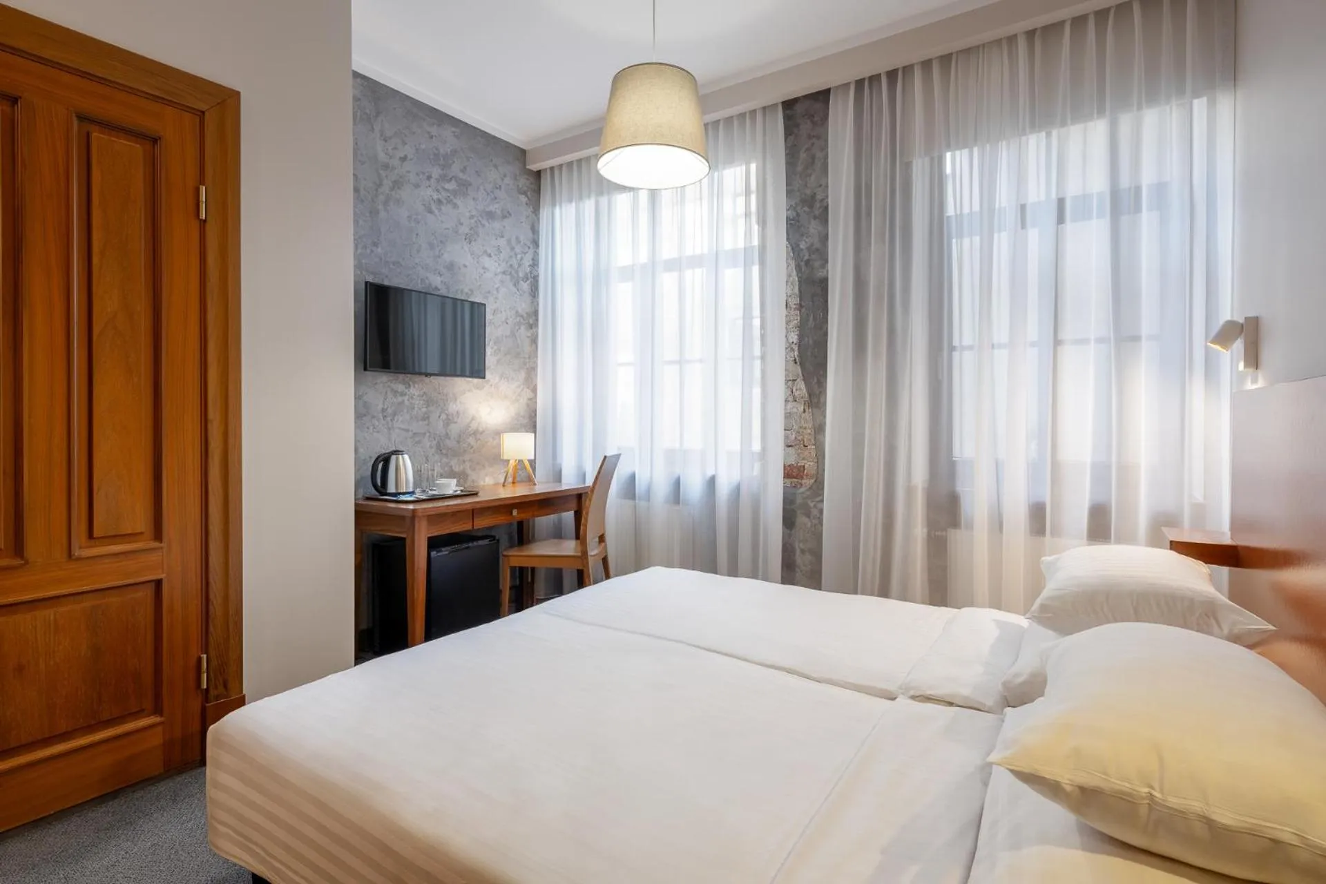 Bed in RIJA Riga City Centre Hotel