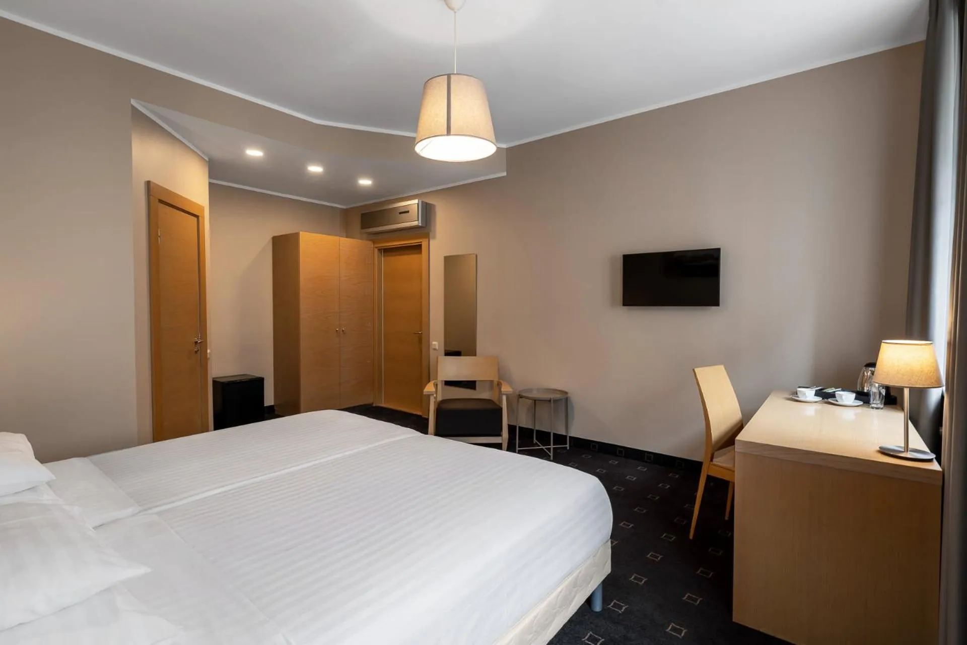 Photo of the whole room, Bed in RIJA Riga City Centre Hotel