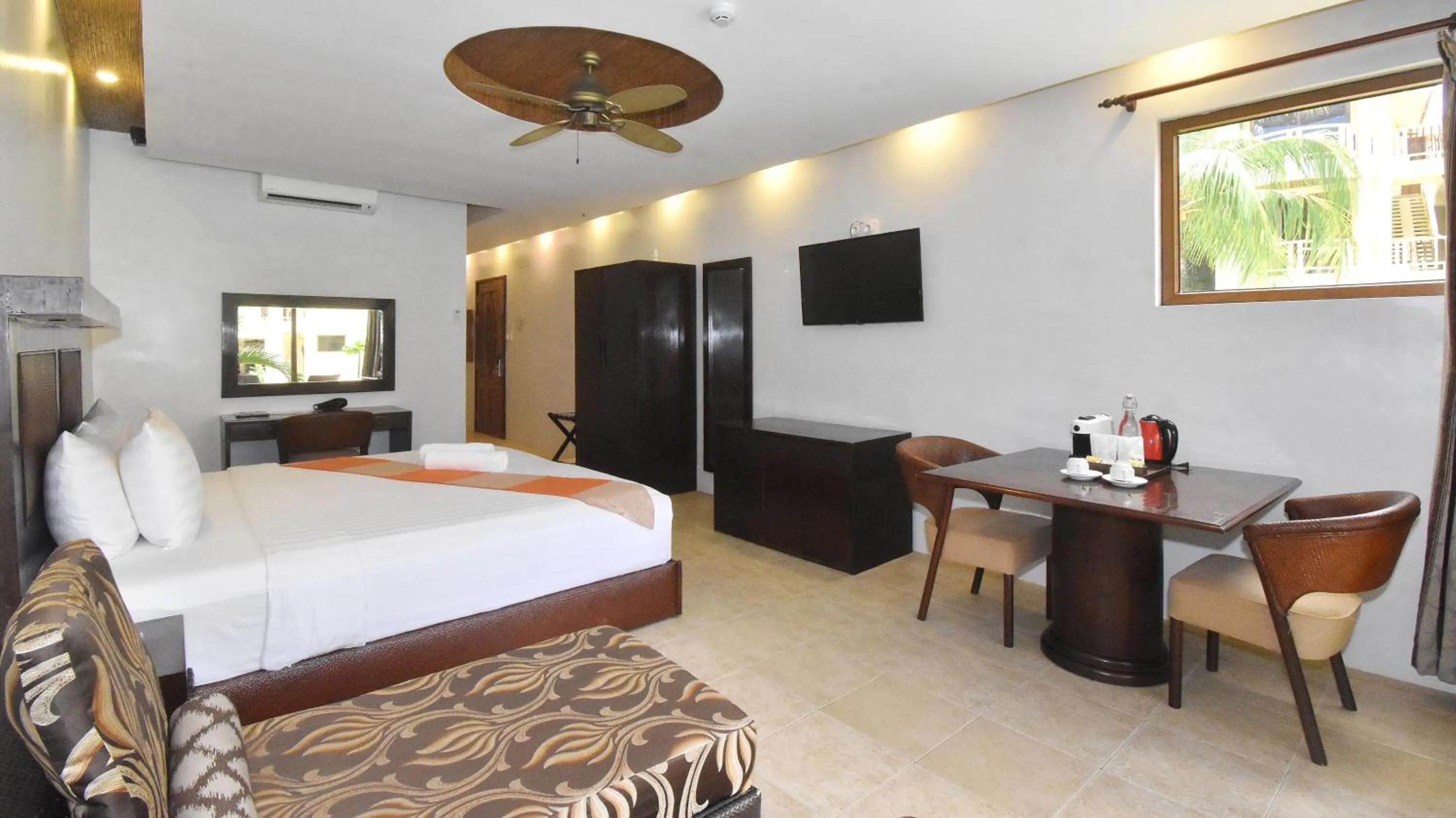 Bed in Ambassador In Paradise