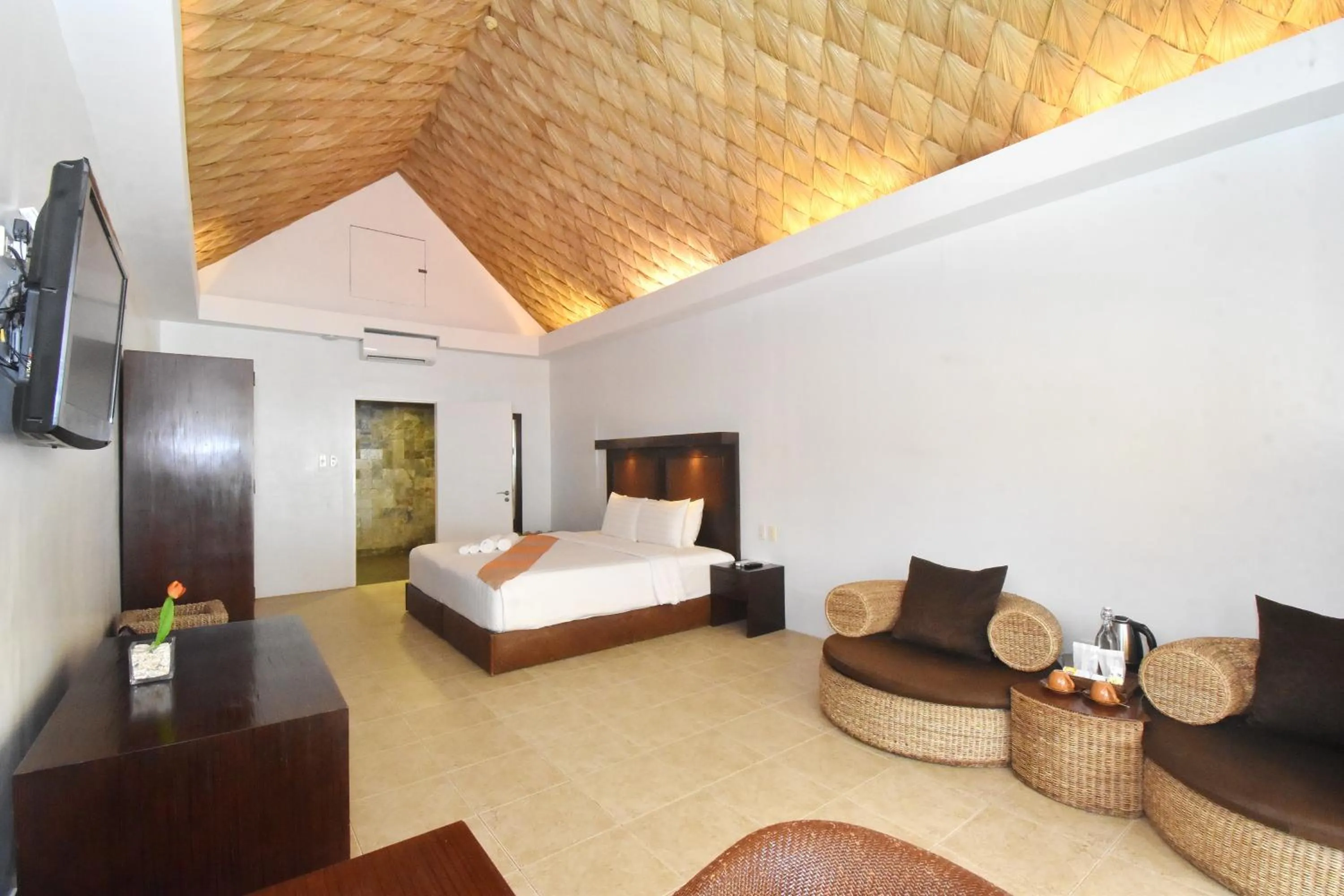 Bed in Ambassador In Paradise