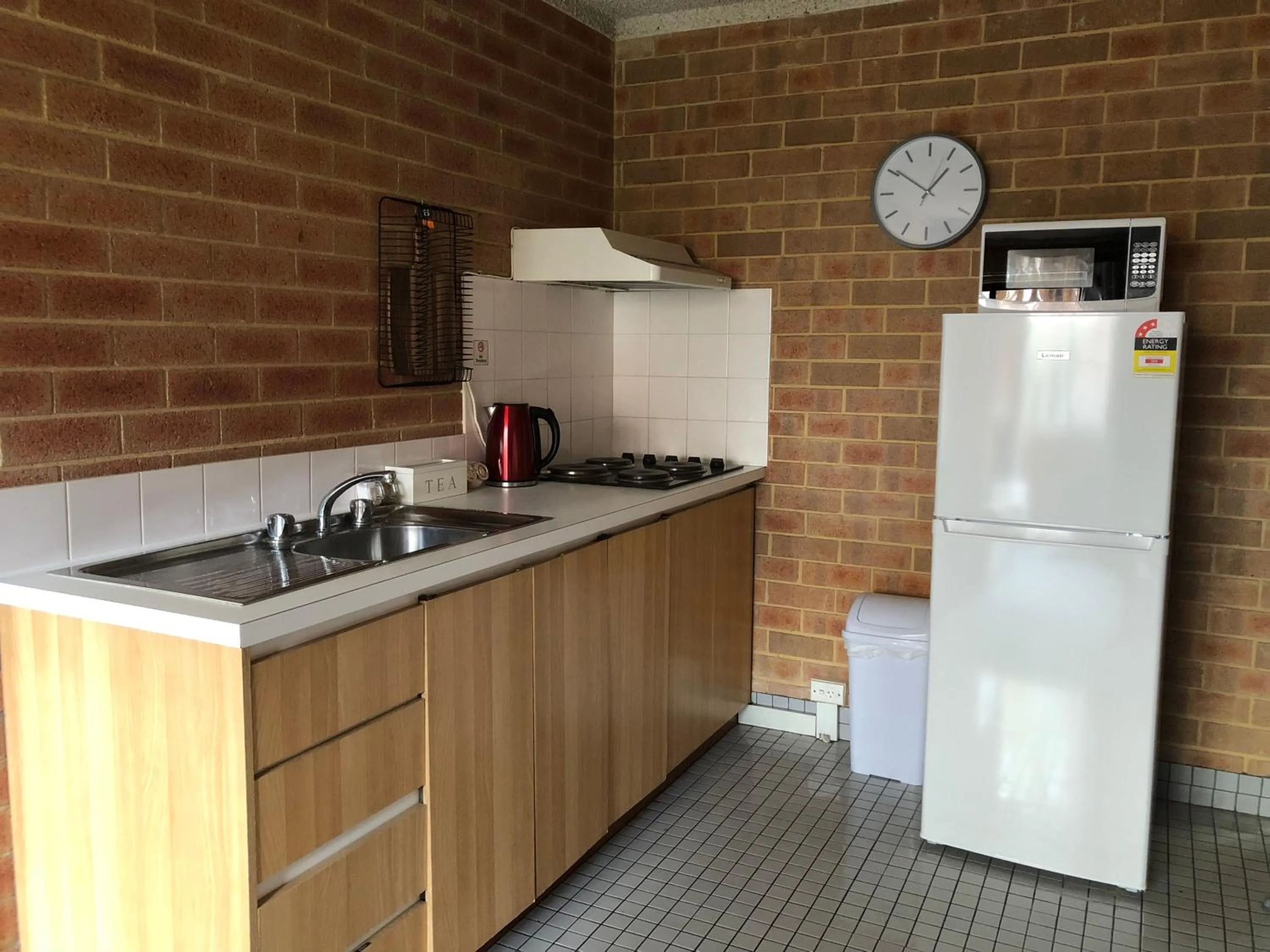 Kitchen or kitchenette in Wheeler Apartments Perth