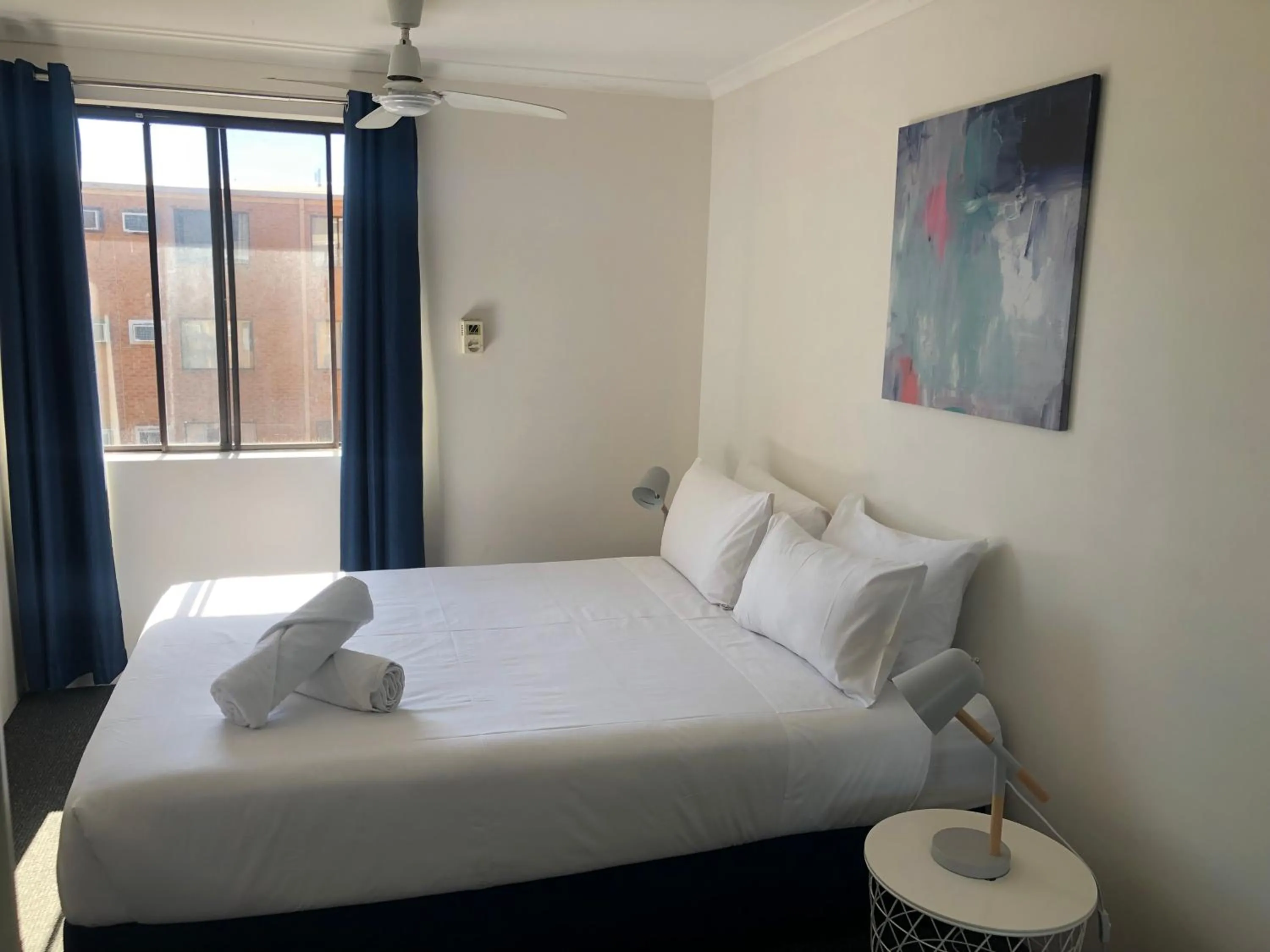 Photo of the whole room, Bed in Wheeler Apartments Perth