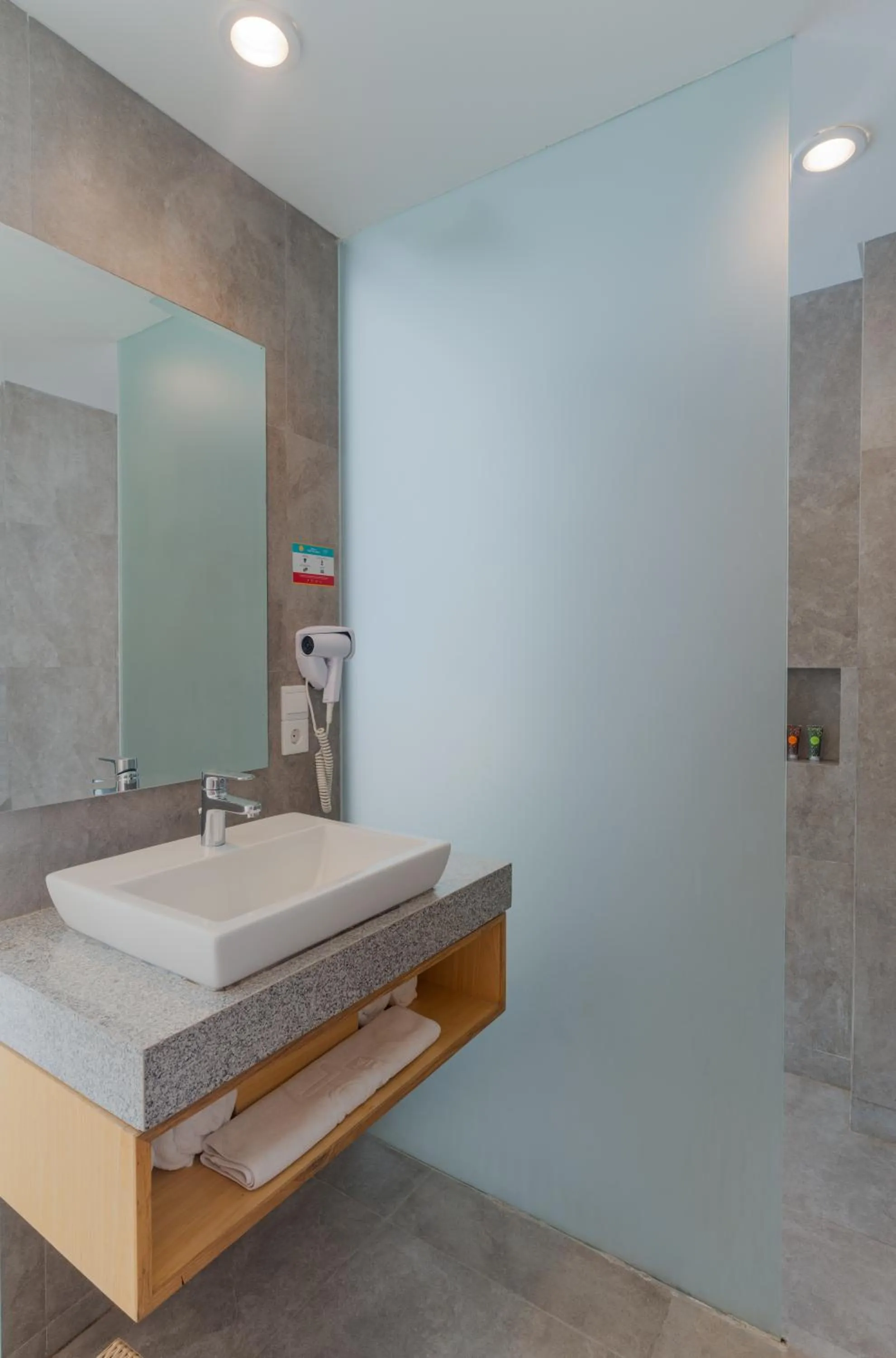 Bathroom in SOL by Meliá Kuta Bali