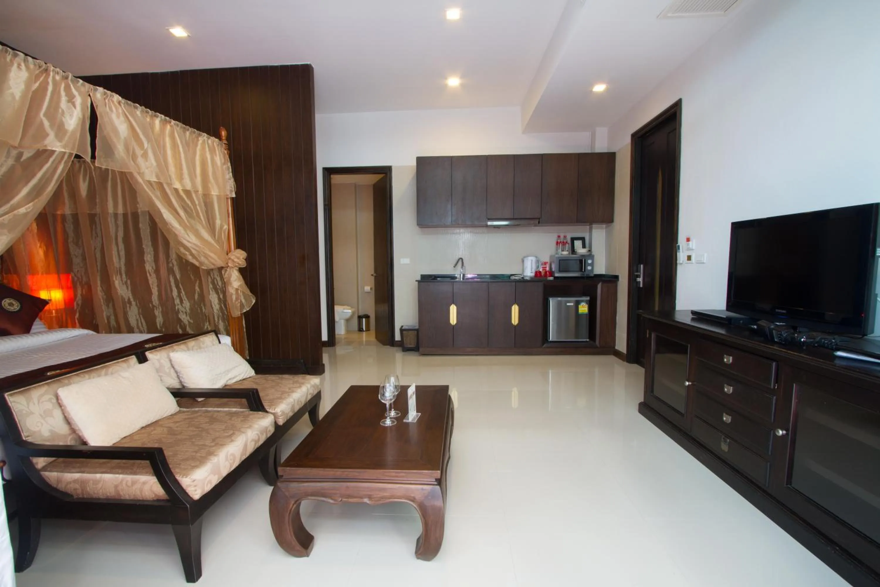 Living room in Royal Thai Pavilion Jomtien Hotel