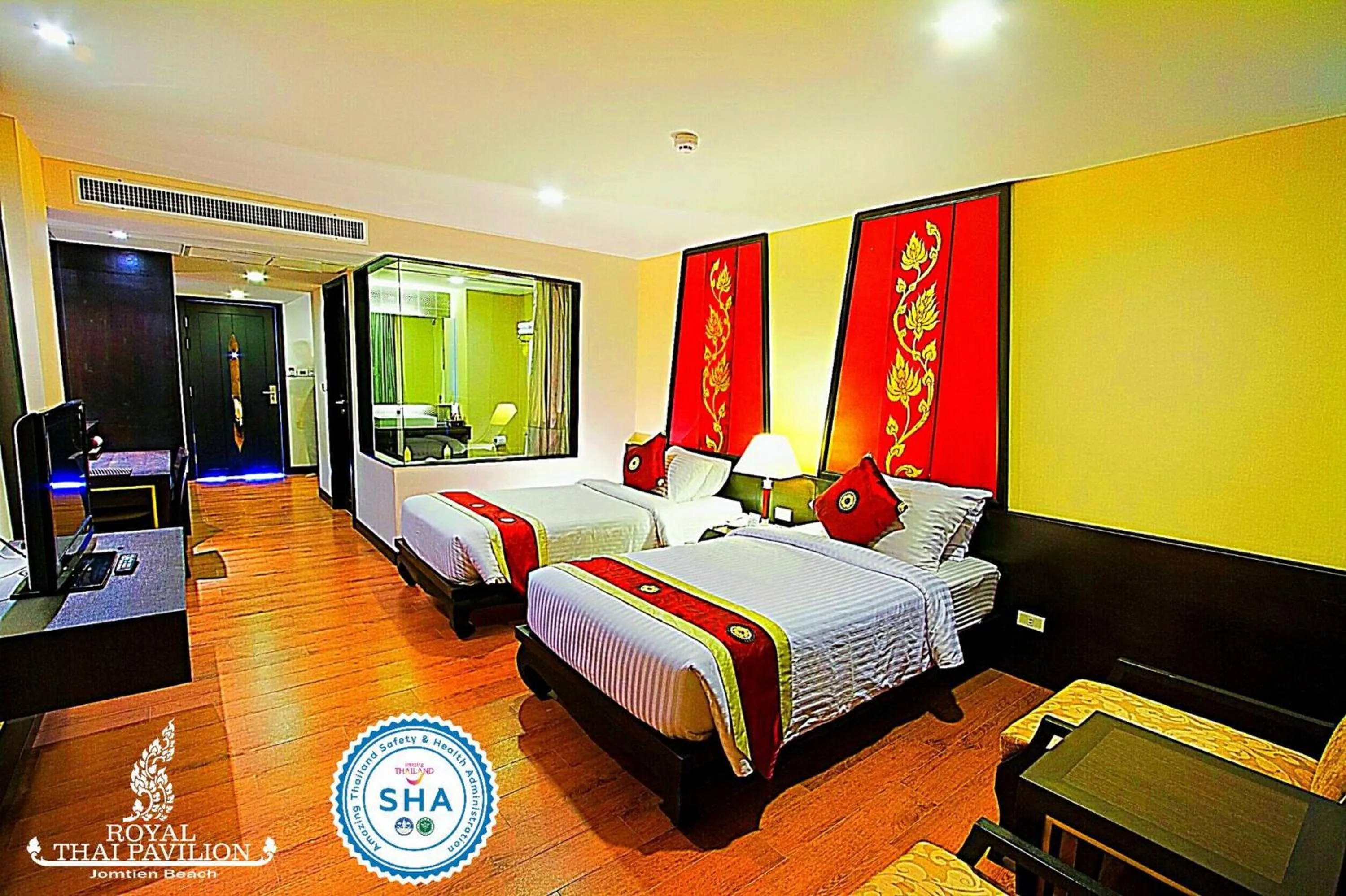 Bed in Royal Thai Pavilion Jomtien Hotel