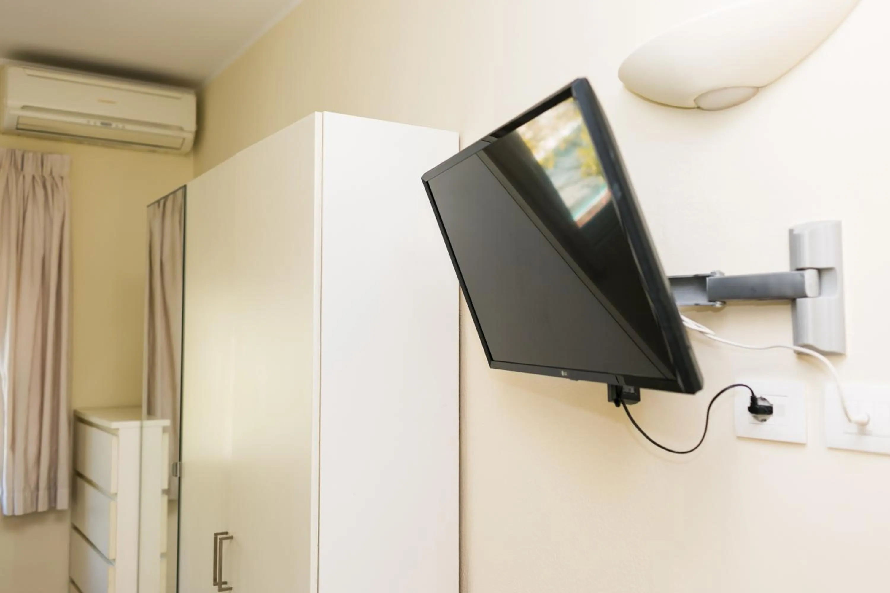 TV and multimedia in Rex Hotel Residence