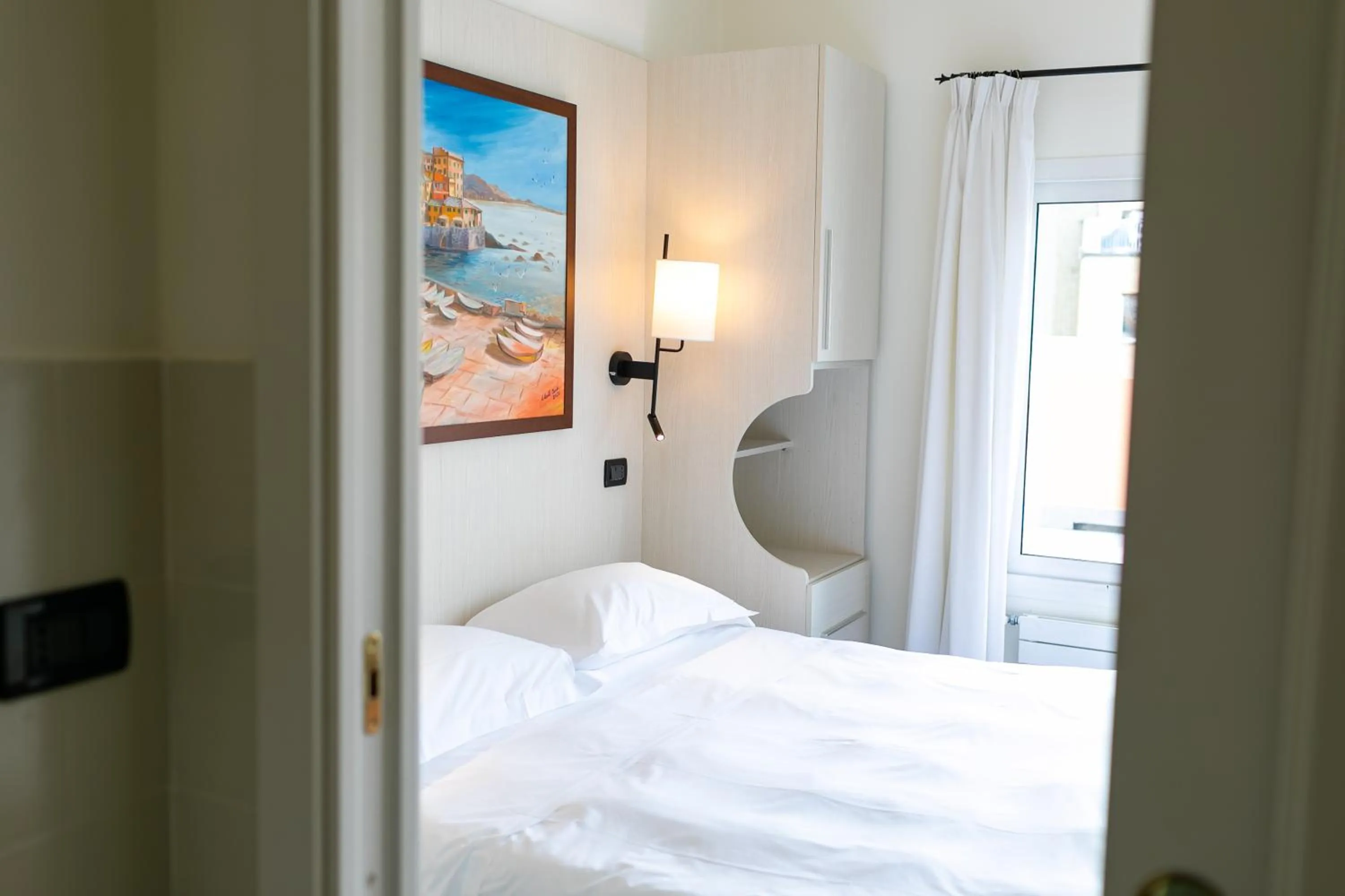 Bed in Rex Hotel Residence