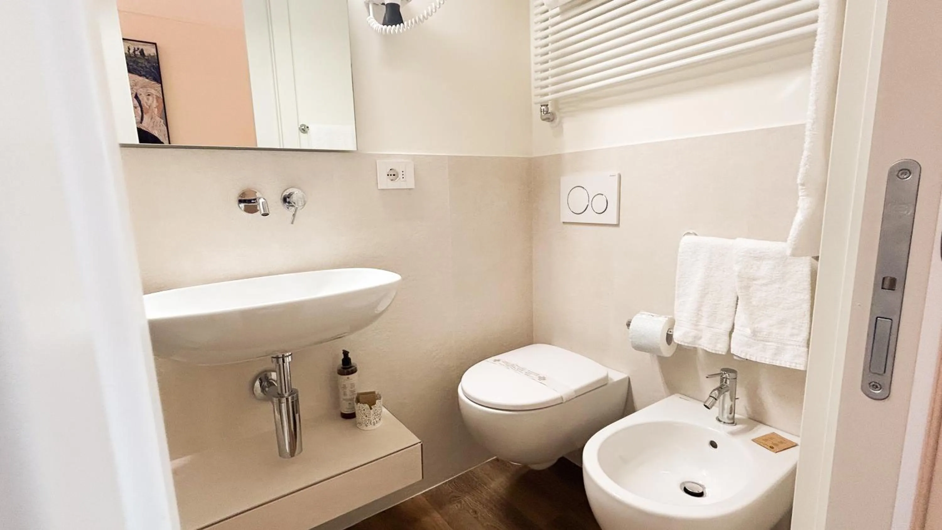 Toilet in Rex Hotel Residence