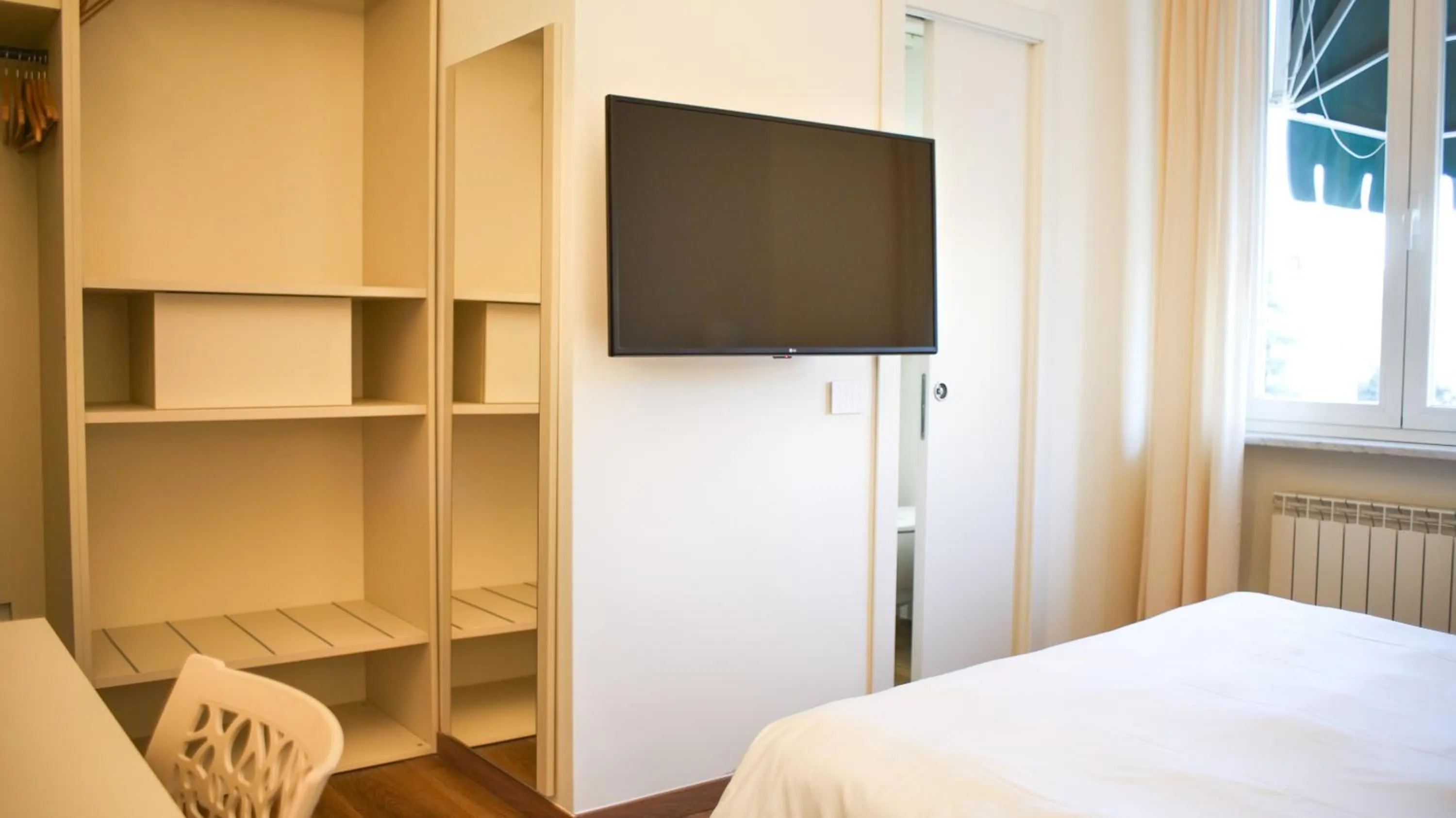 TV and multimedia, Bed in Rex Hotel Residence