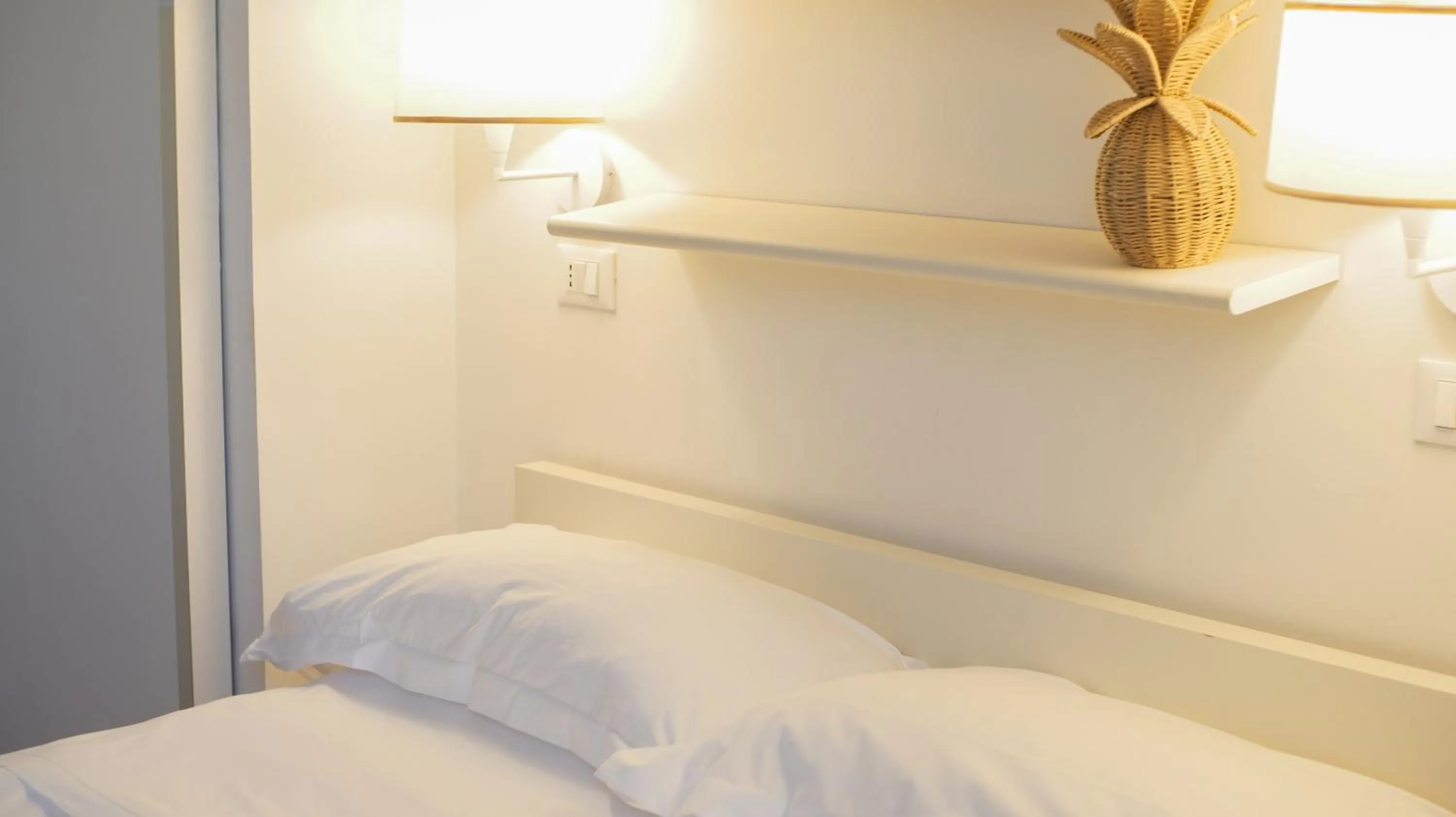 Bed in Rex Hotel Residence