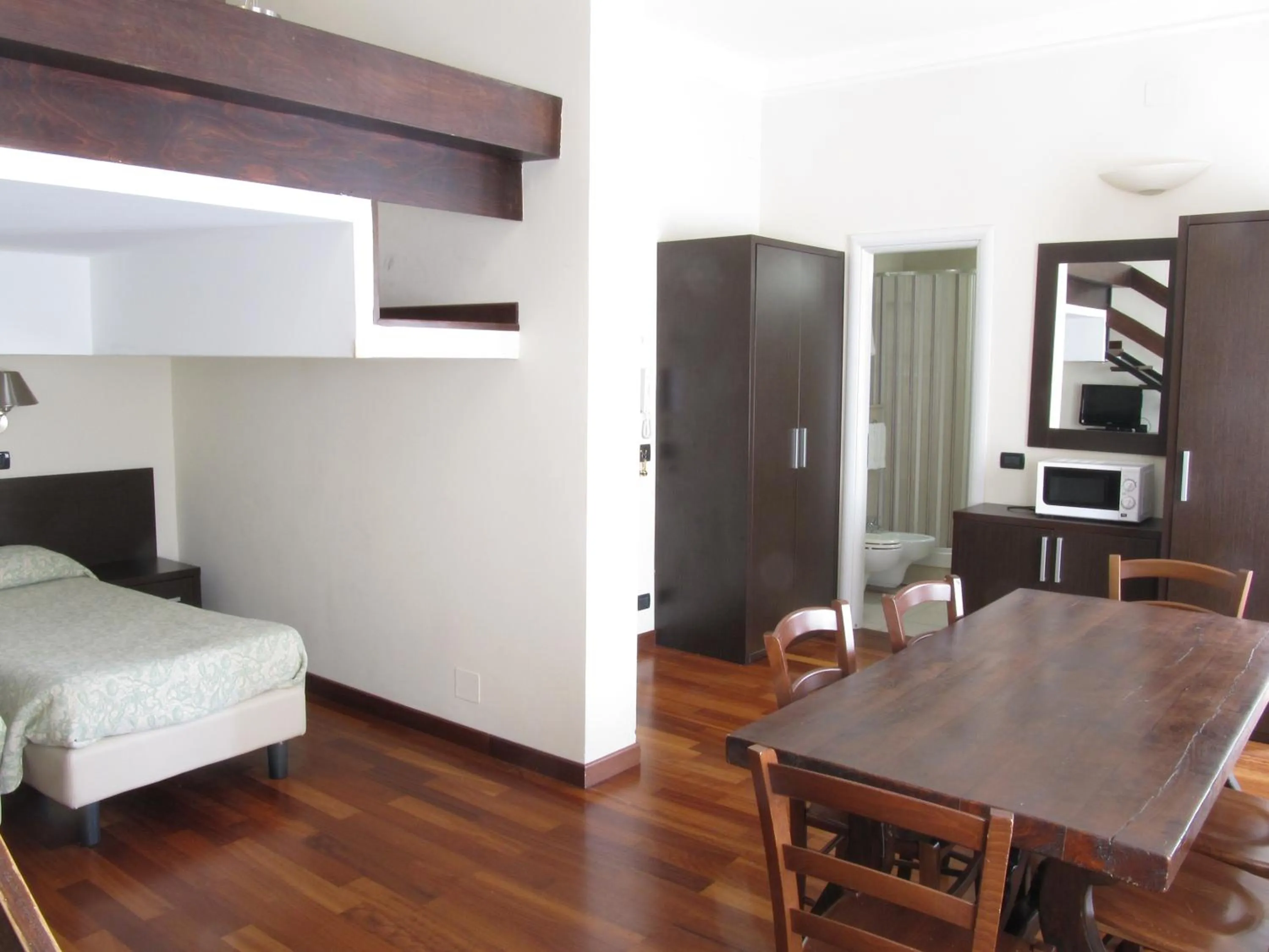 Photo of the whole room, Bed in Rex Hotel Residence