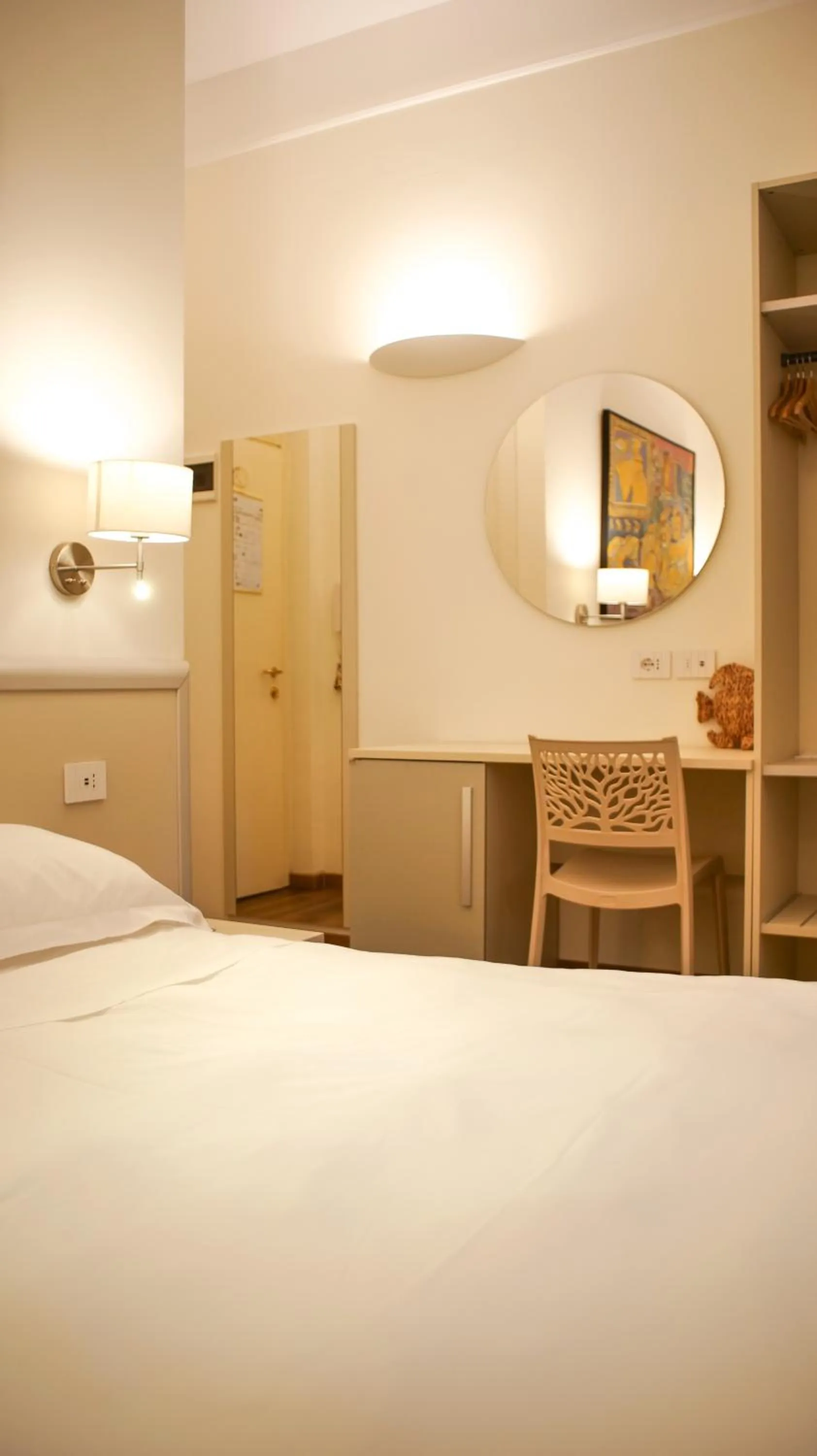 Bed in Rex Hotel Residence