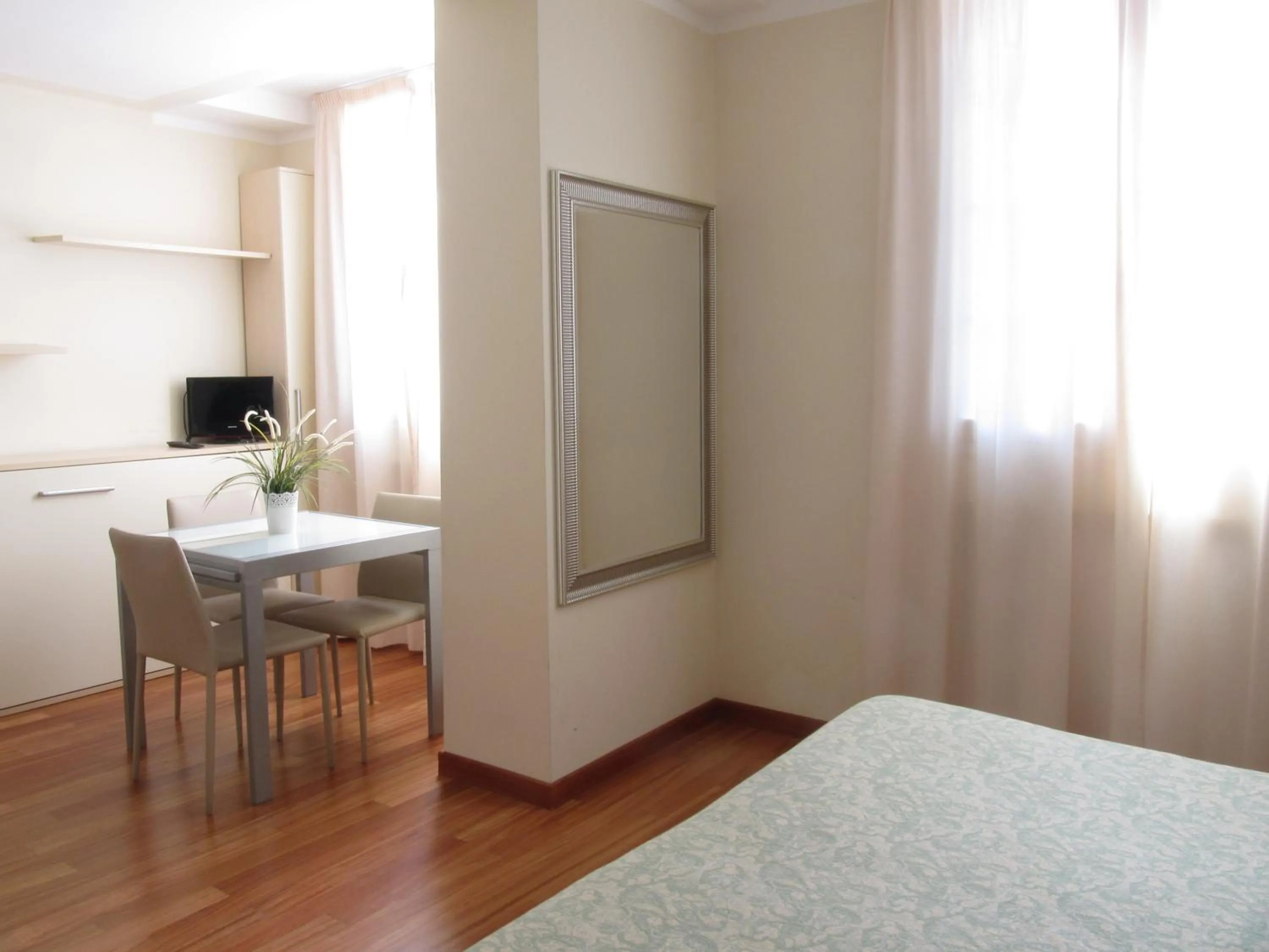 Photo of the whole room, Bed in Rex Hotel Residence