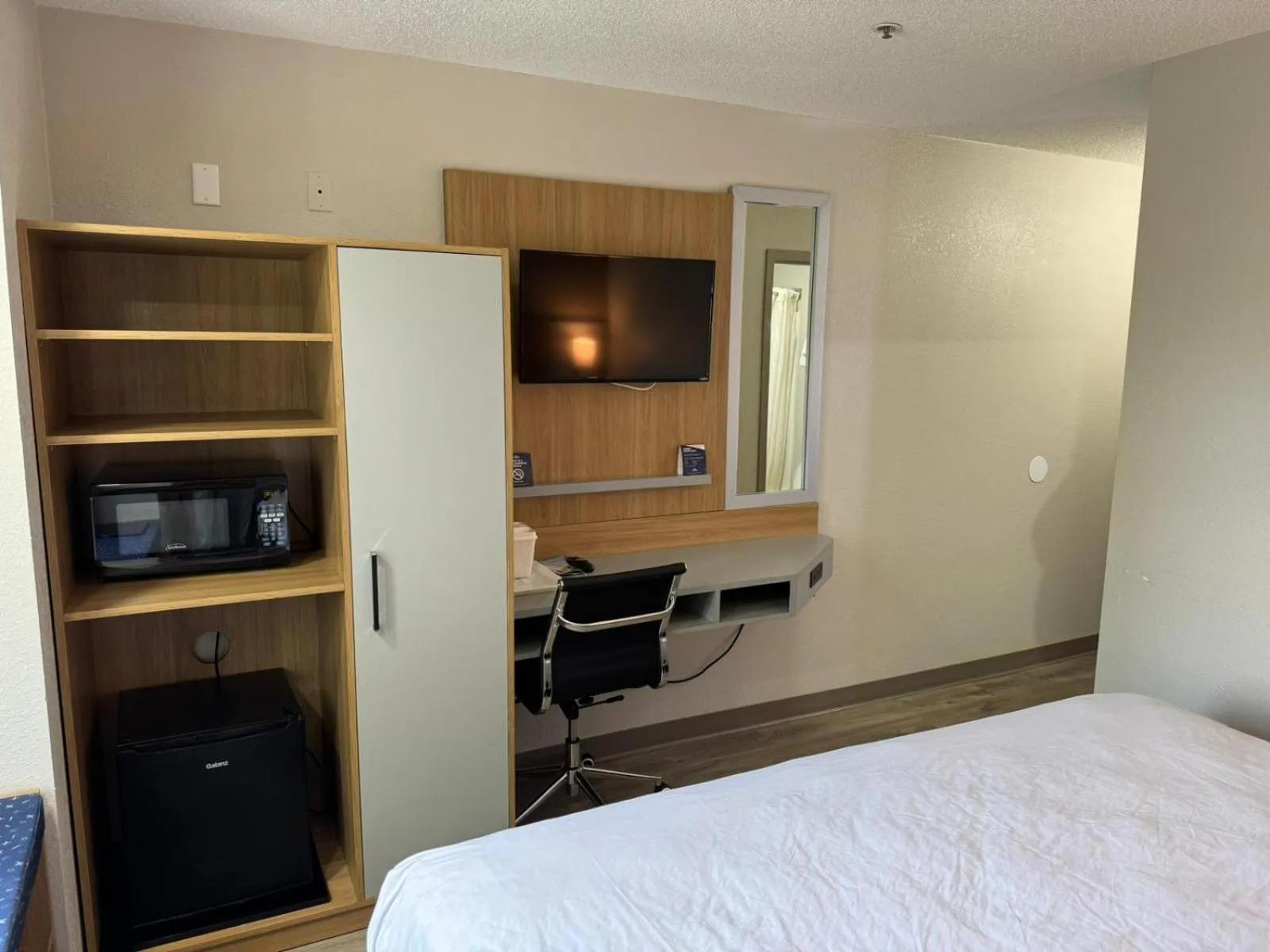 wardrobe, Bed in Microtel Inn by Wyndham Winston-Salem