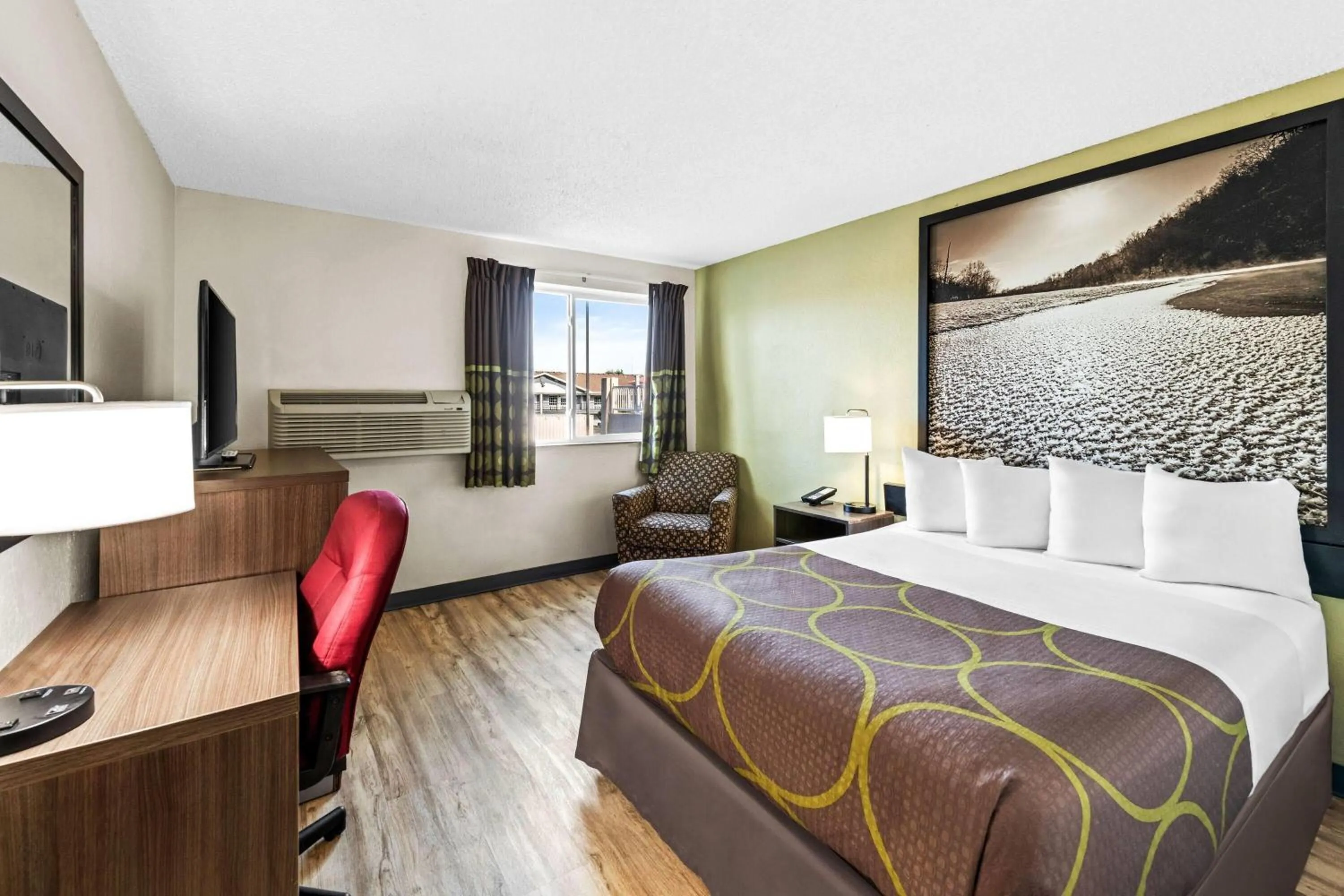 Bed in Super 8 by Wyndham Independence Kansas City