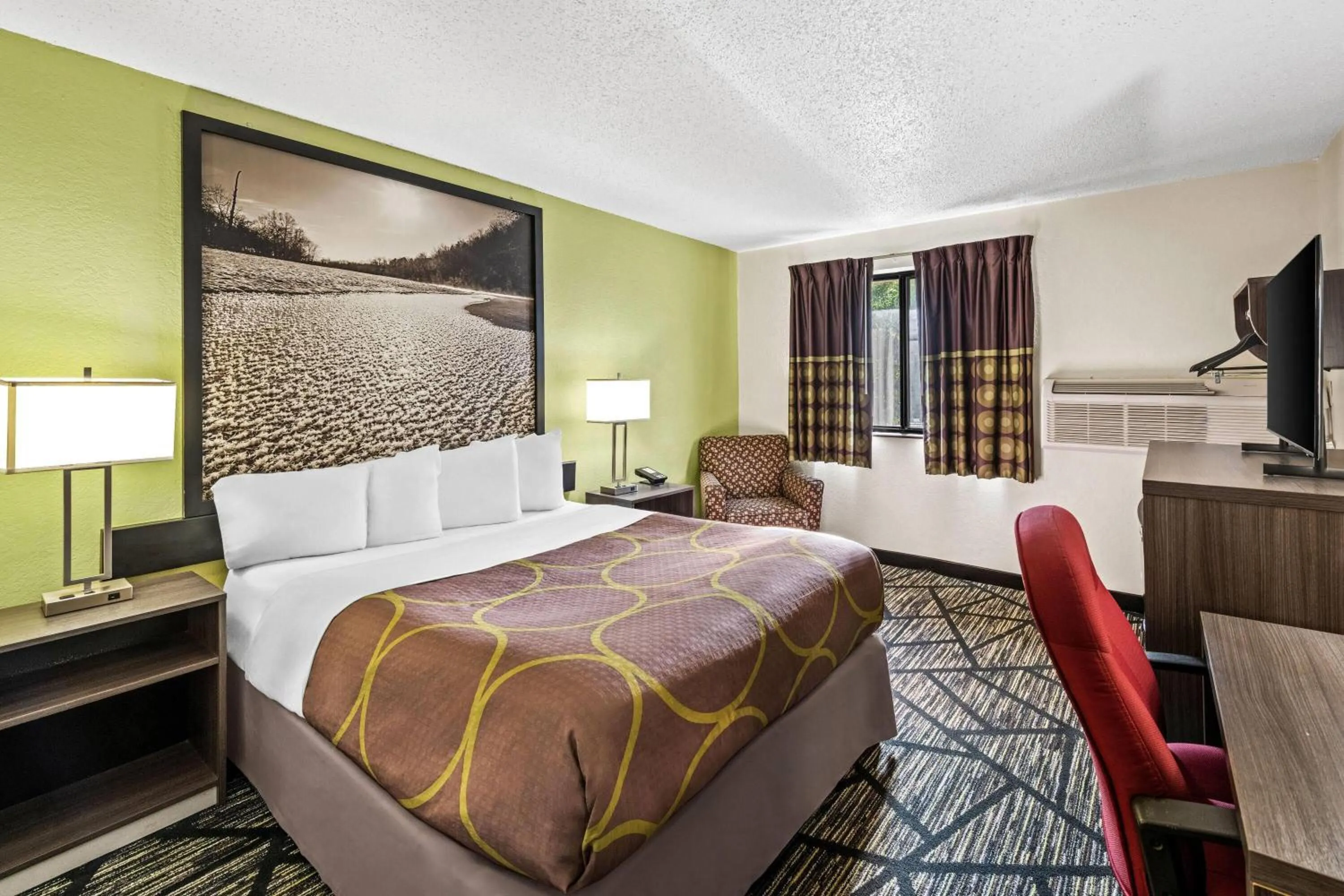 Bed in Super 8 by Wyndham Independence Kansas City