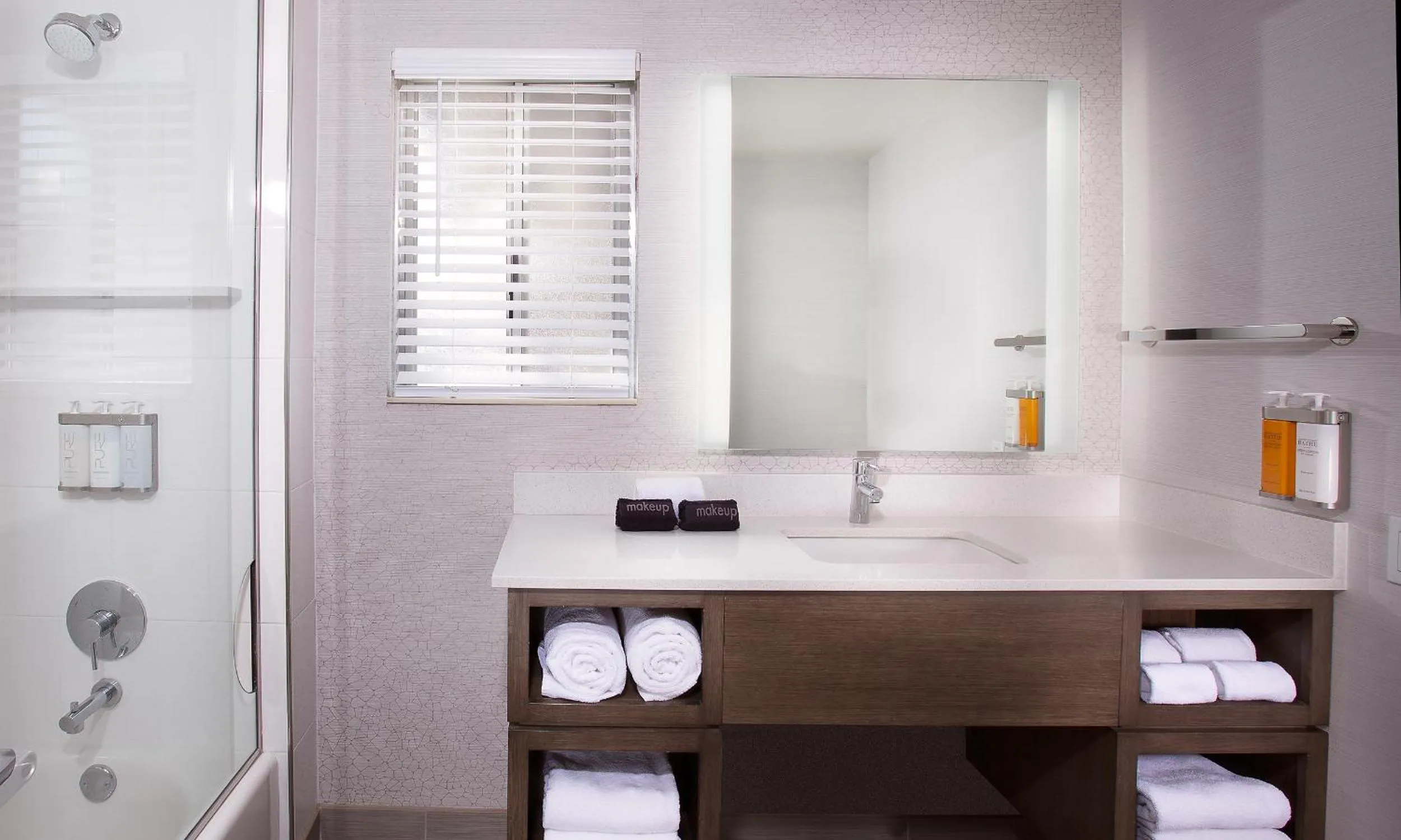 Bathroom in West Beach Inn, a Coast Hotel