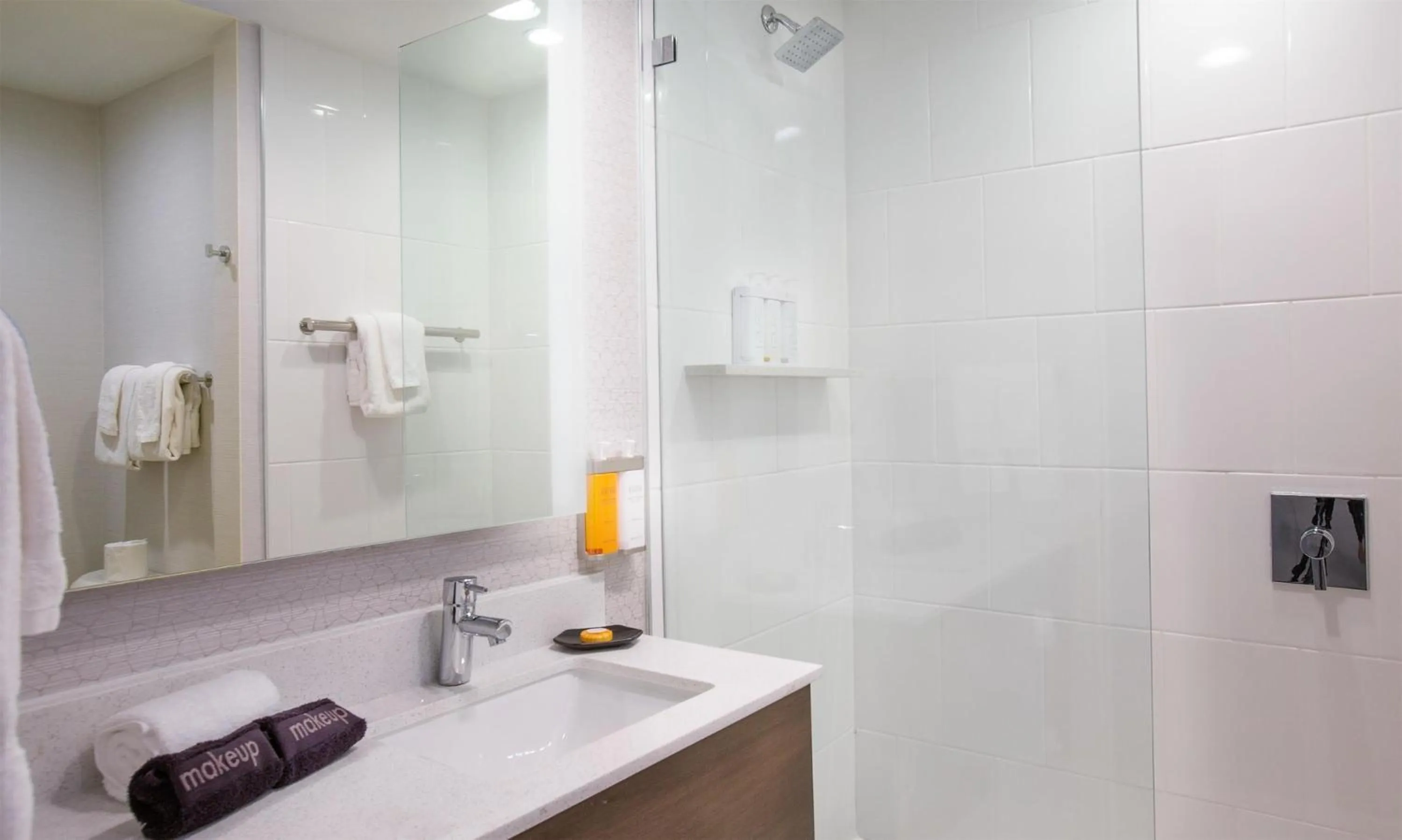 Bathroom in West Beach Inn, a Coast Hotel