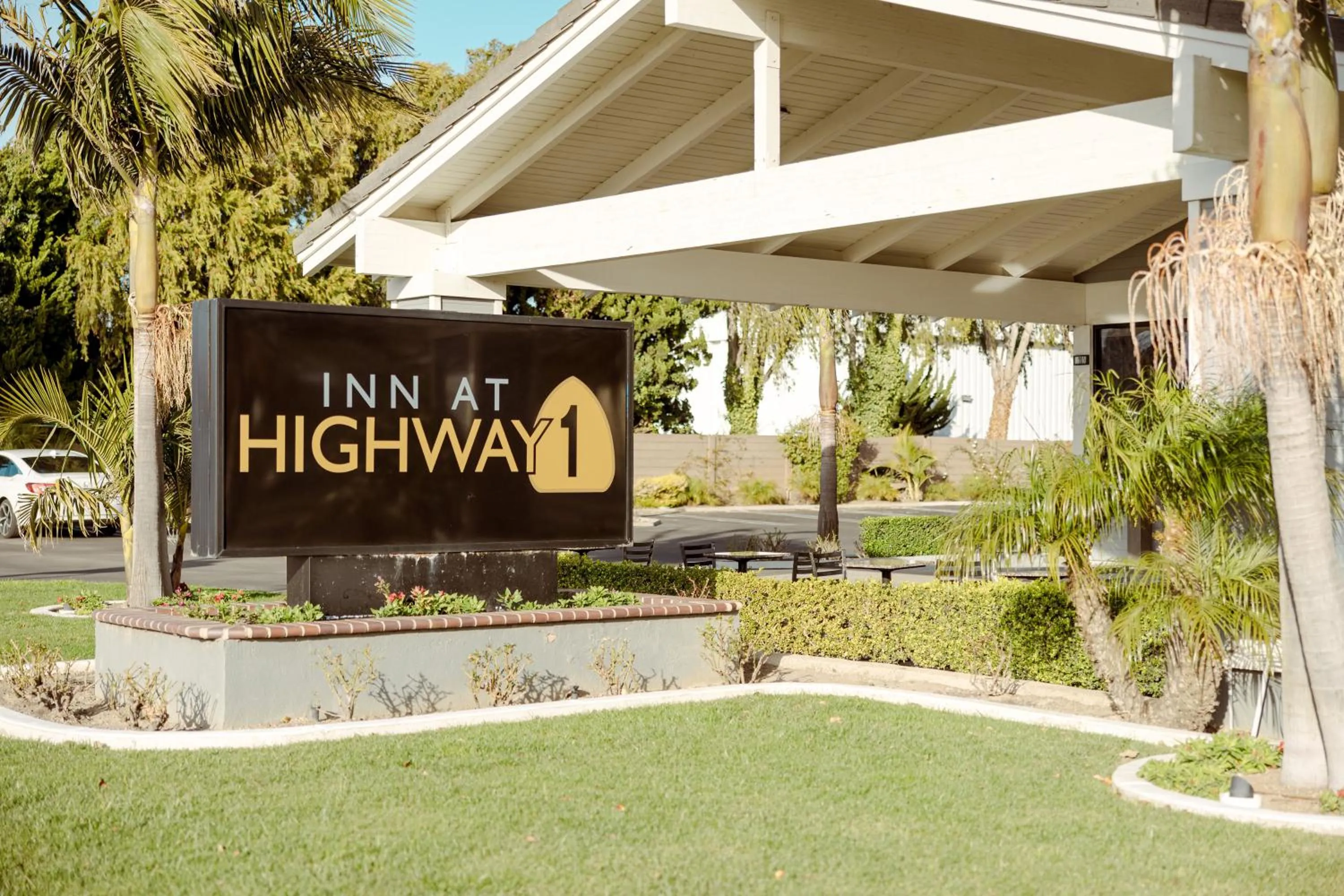 Property logo or sign in Inn at Highway 1