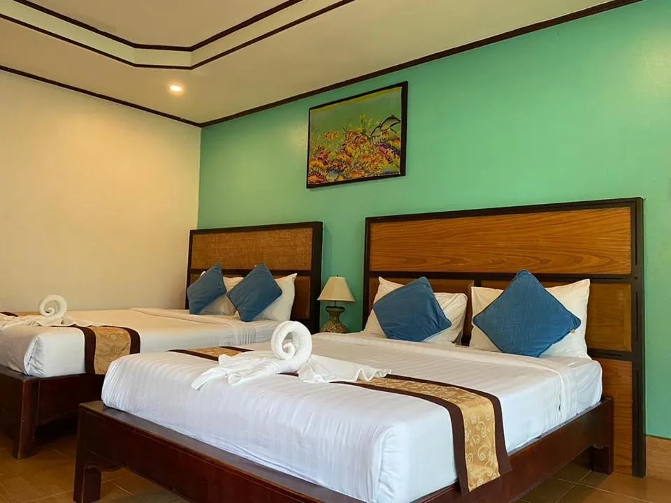 Bed in Koh Chang Bailan Beach Resort