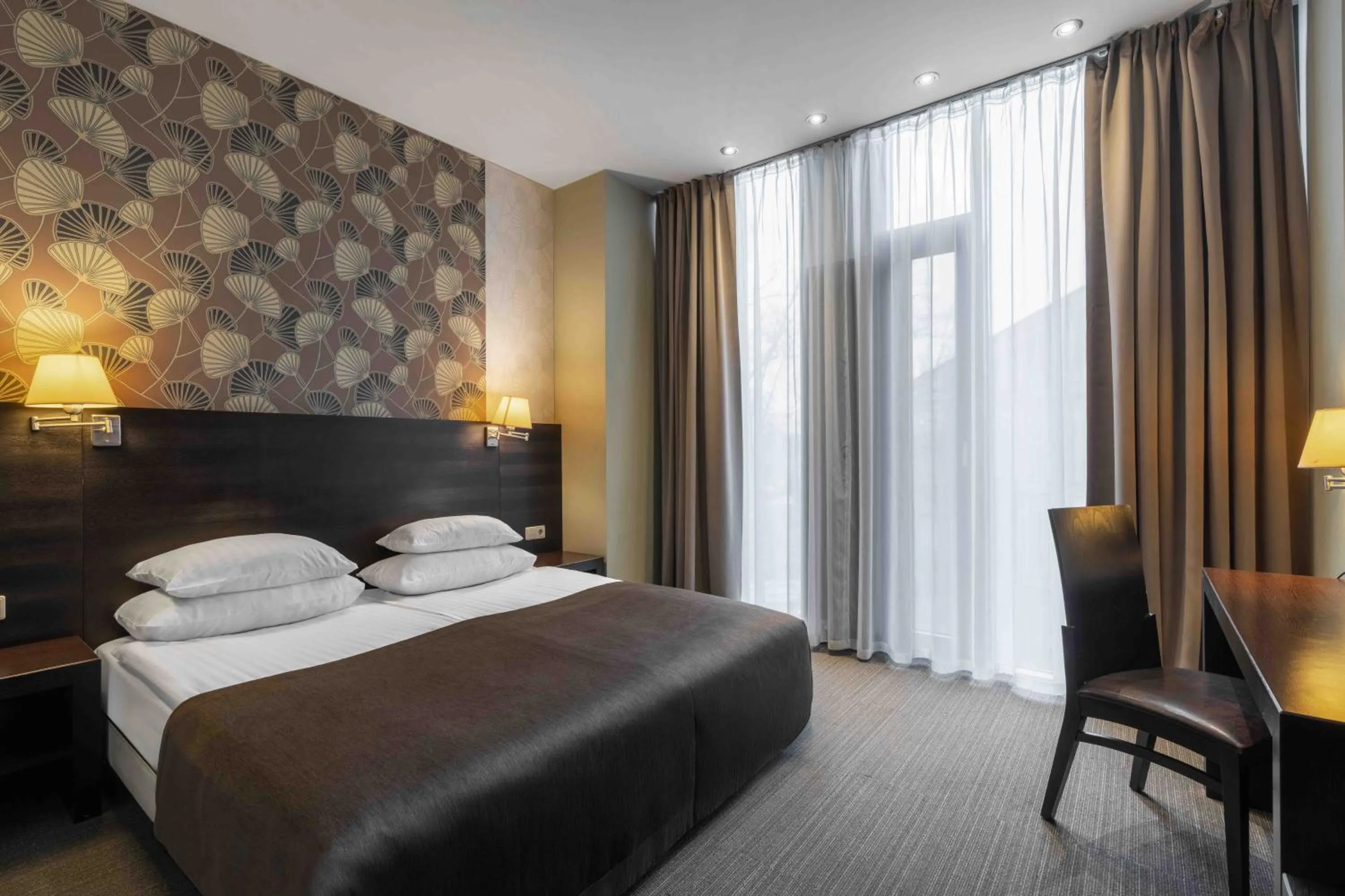 Bed in Rixwell Elefant Hotel