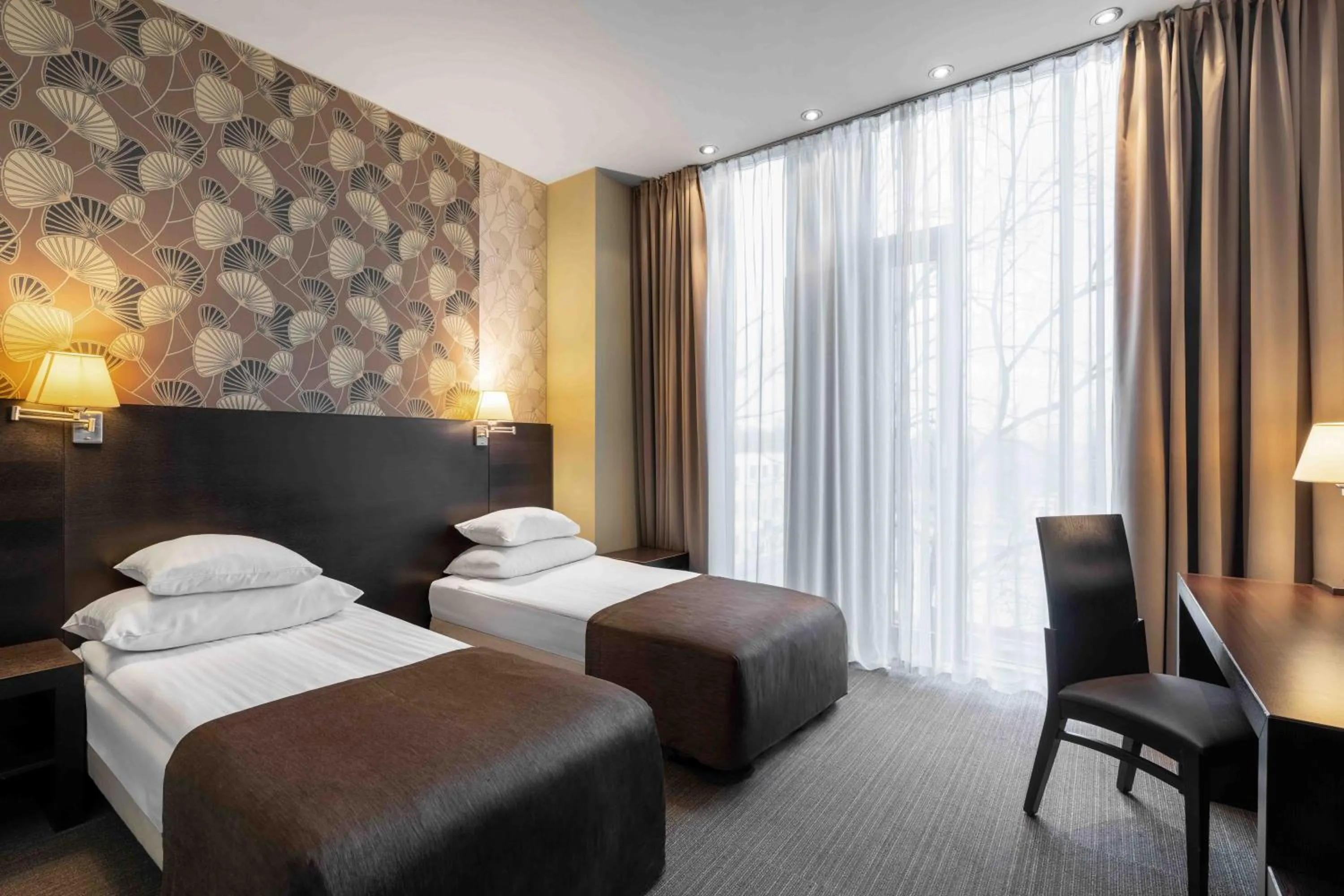 Bed in Rixwell Elefant Hotel