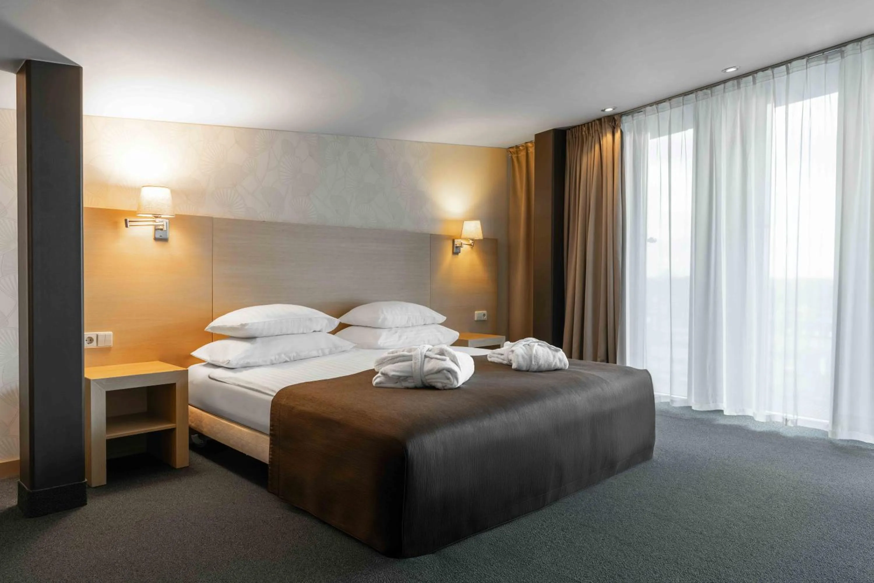 Bed in Rixwell Elefant Hotel