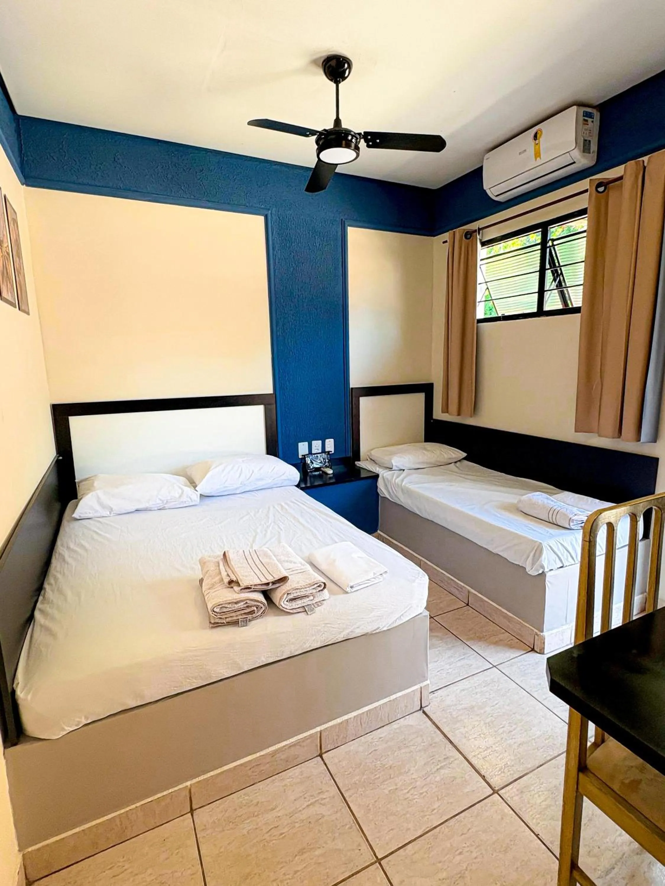 Bed in Pousada Caminhos do Interior