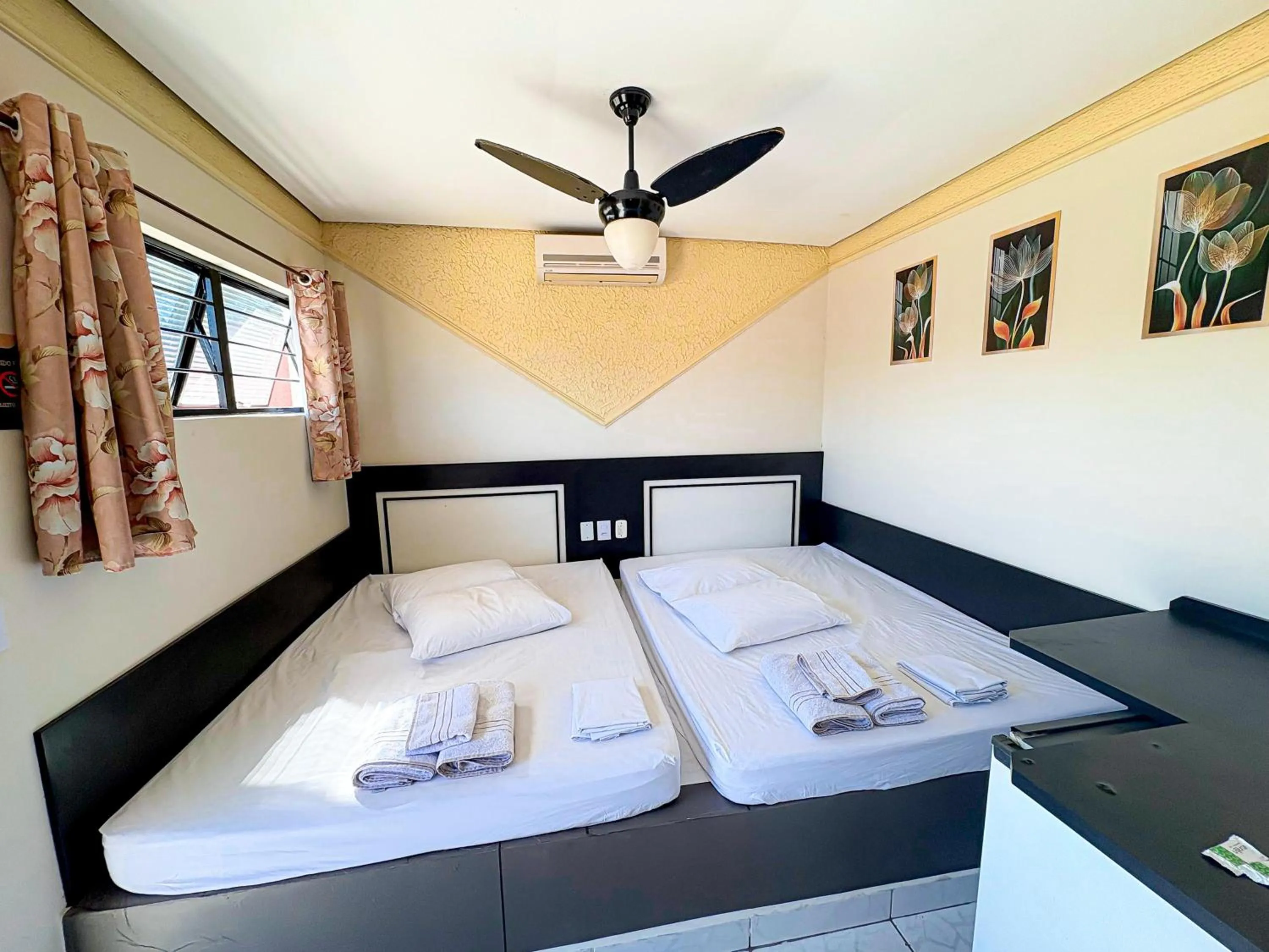 Bed in Pousada Caminhos do Interior