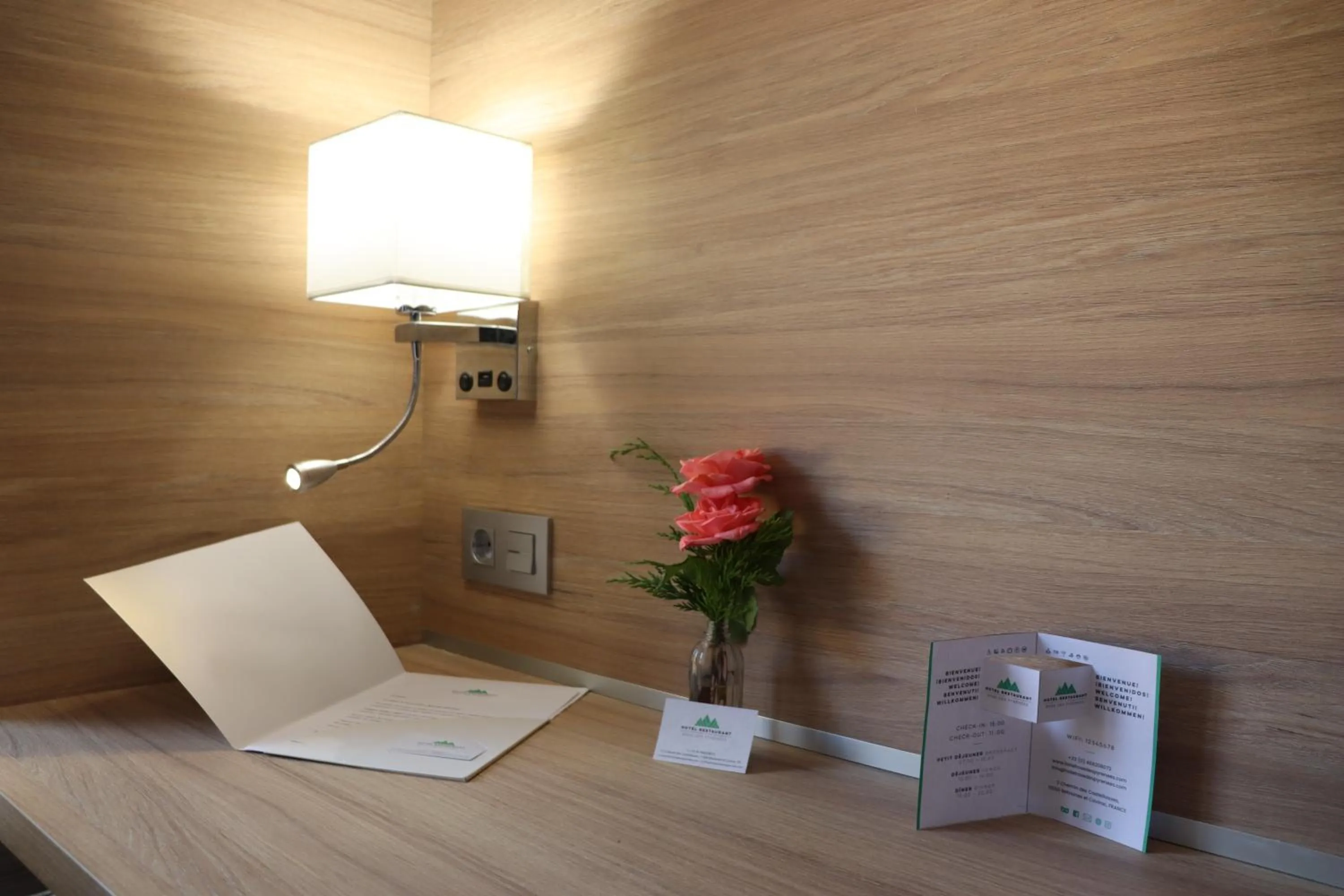 Bedroom in Hotel Restaurant Rose des Pyrénées