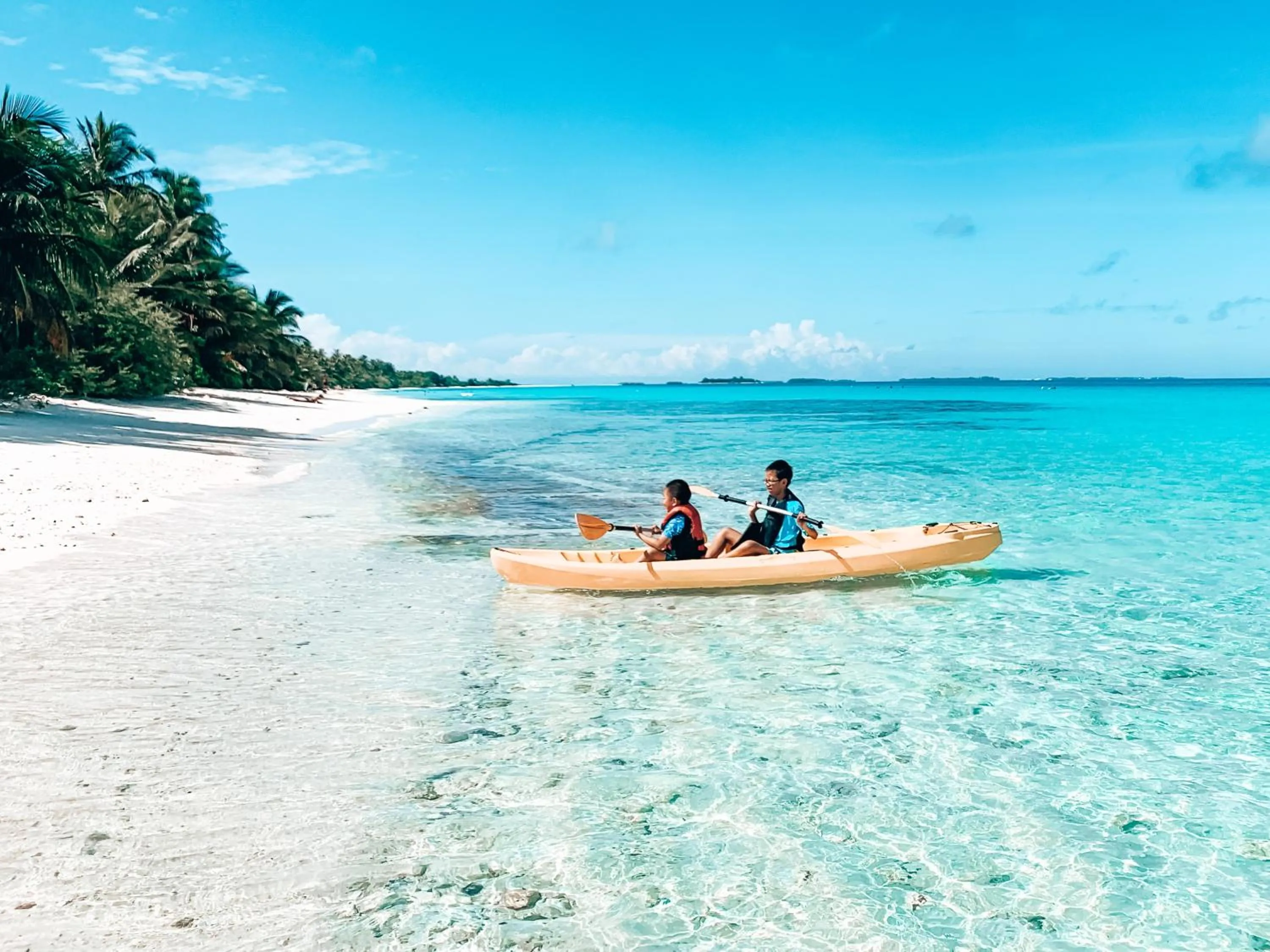 Canoeing in Bliss Dhigurah
