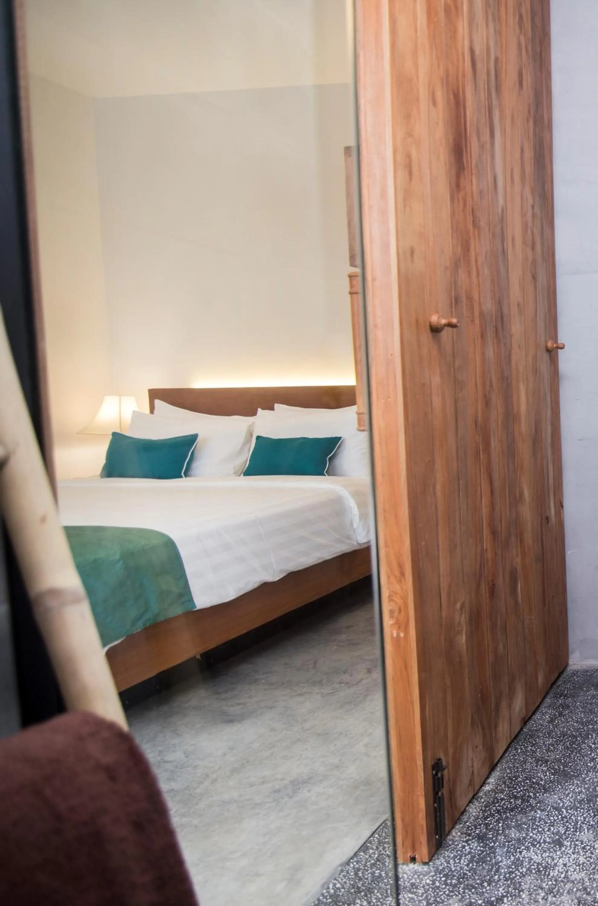 Bed in Sarina Boutique Hotel