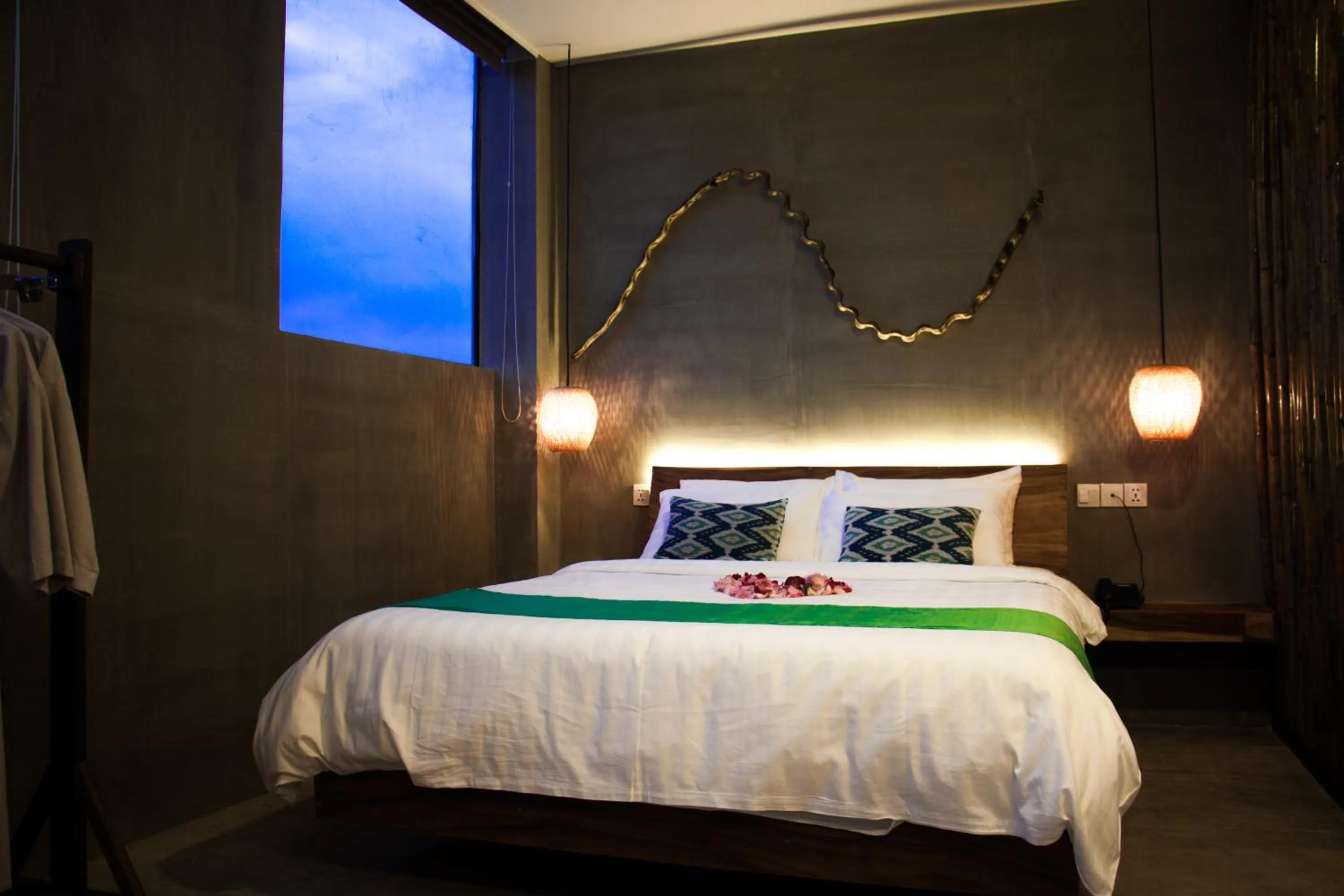 Bed in Sarina Boutique Hotel