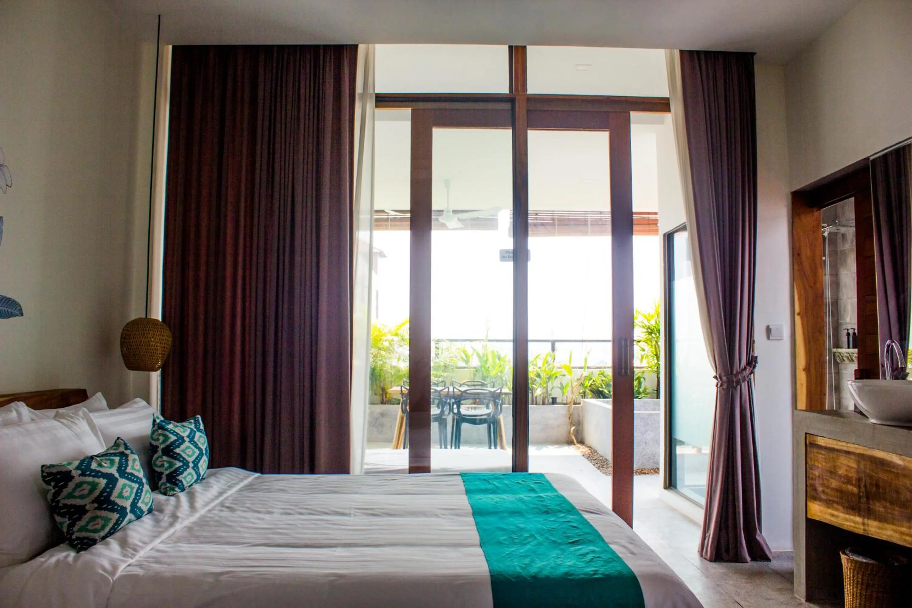 Bed in Sarina Boutique Hotel