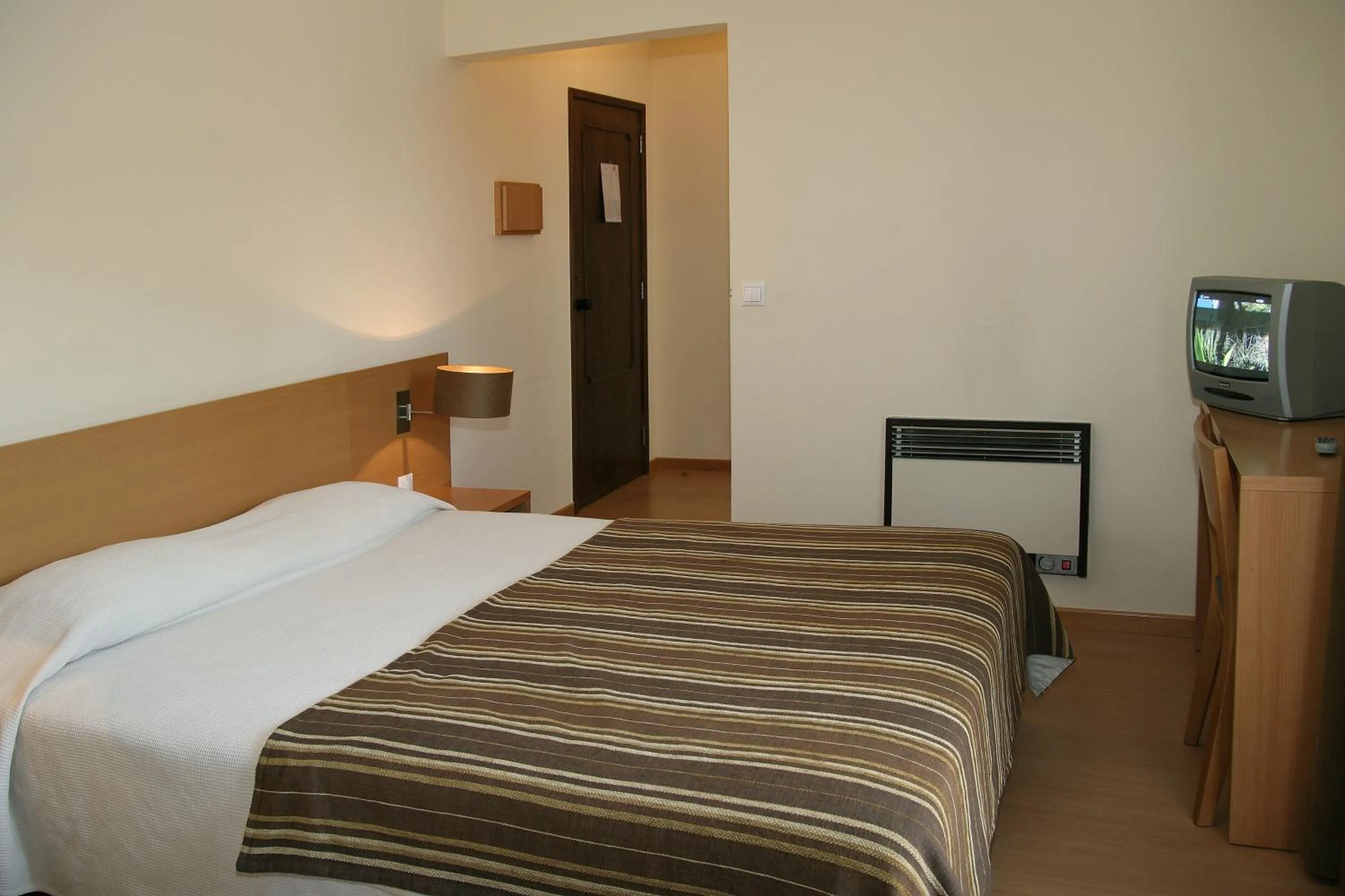 Bedroom, Bed in Arcada Hotel