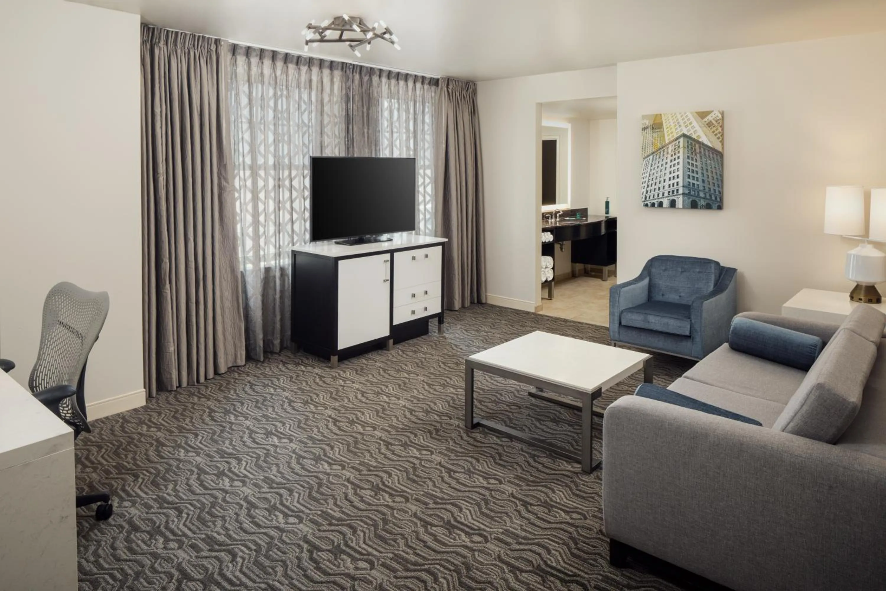 TV and multimedia in DoubleTree Suites by Hilton Hotel Detroit Downtown - Fort Shelby